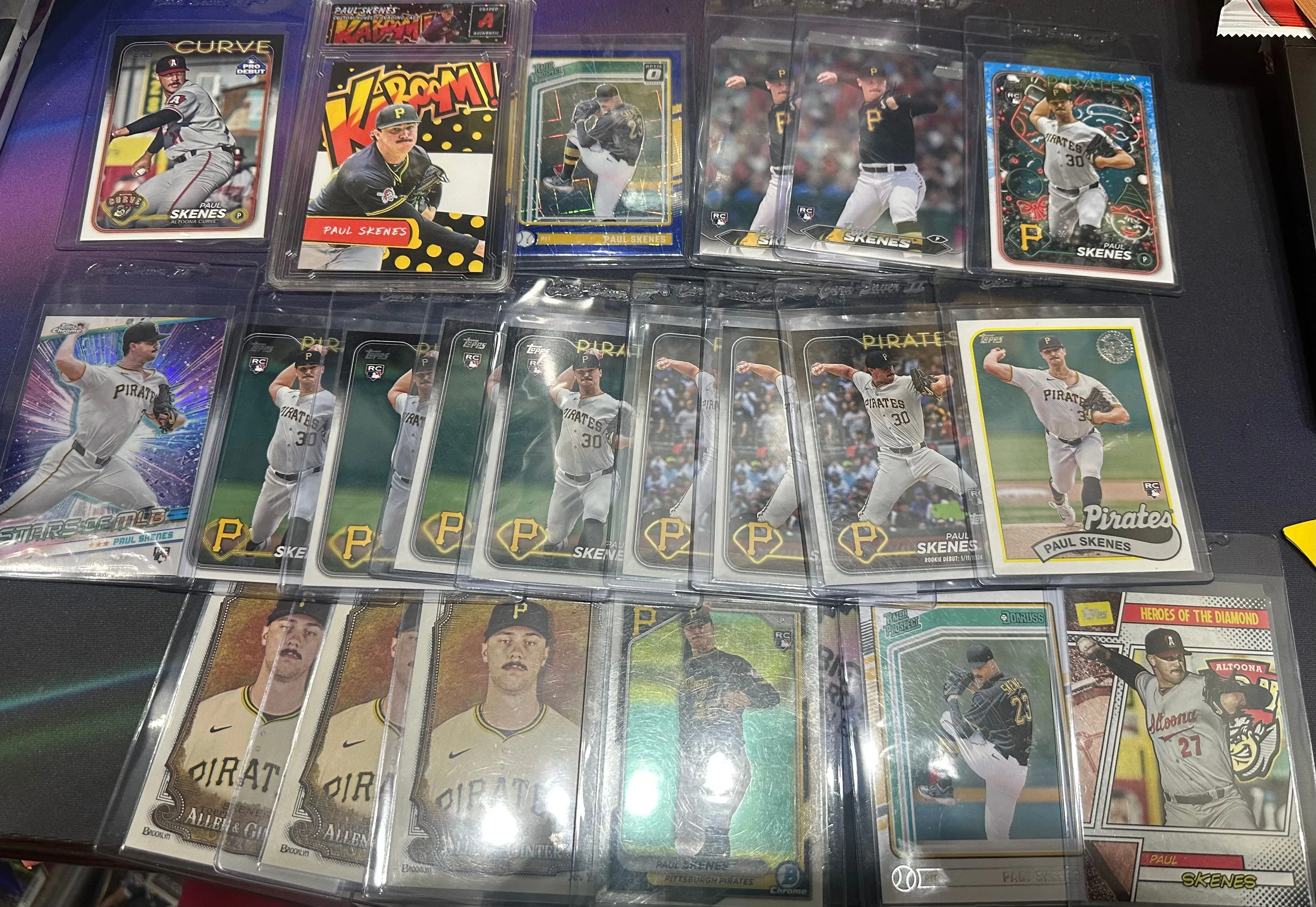 Product image for PAUL SKENES 21 CARD ROOKIE LOT (Includes Blue velocity Optic rated rookie, Kaboom Custom slab & more