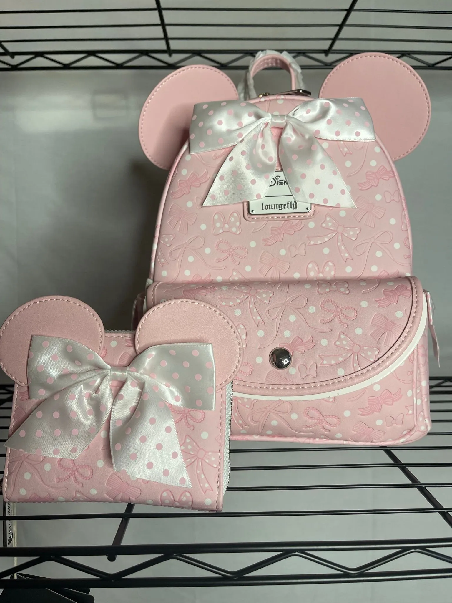 Product image for Loungefly Minnie Pink Bows AOP Backpack & Wallet set