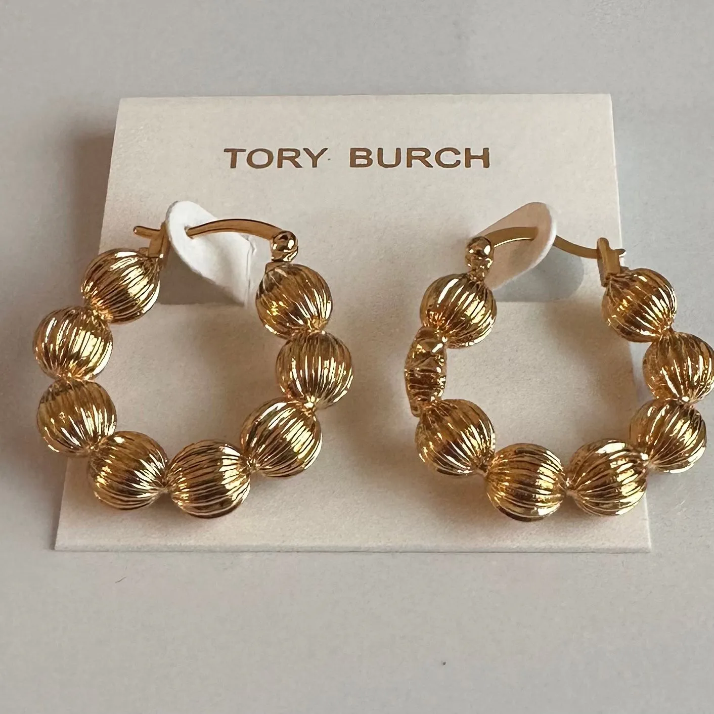Product image for New TORY BURCH ROXANNE FLUTED BEAD HOOP EARRINGS in Gold with TB Earring Card