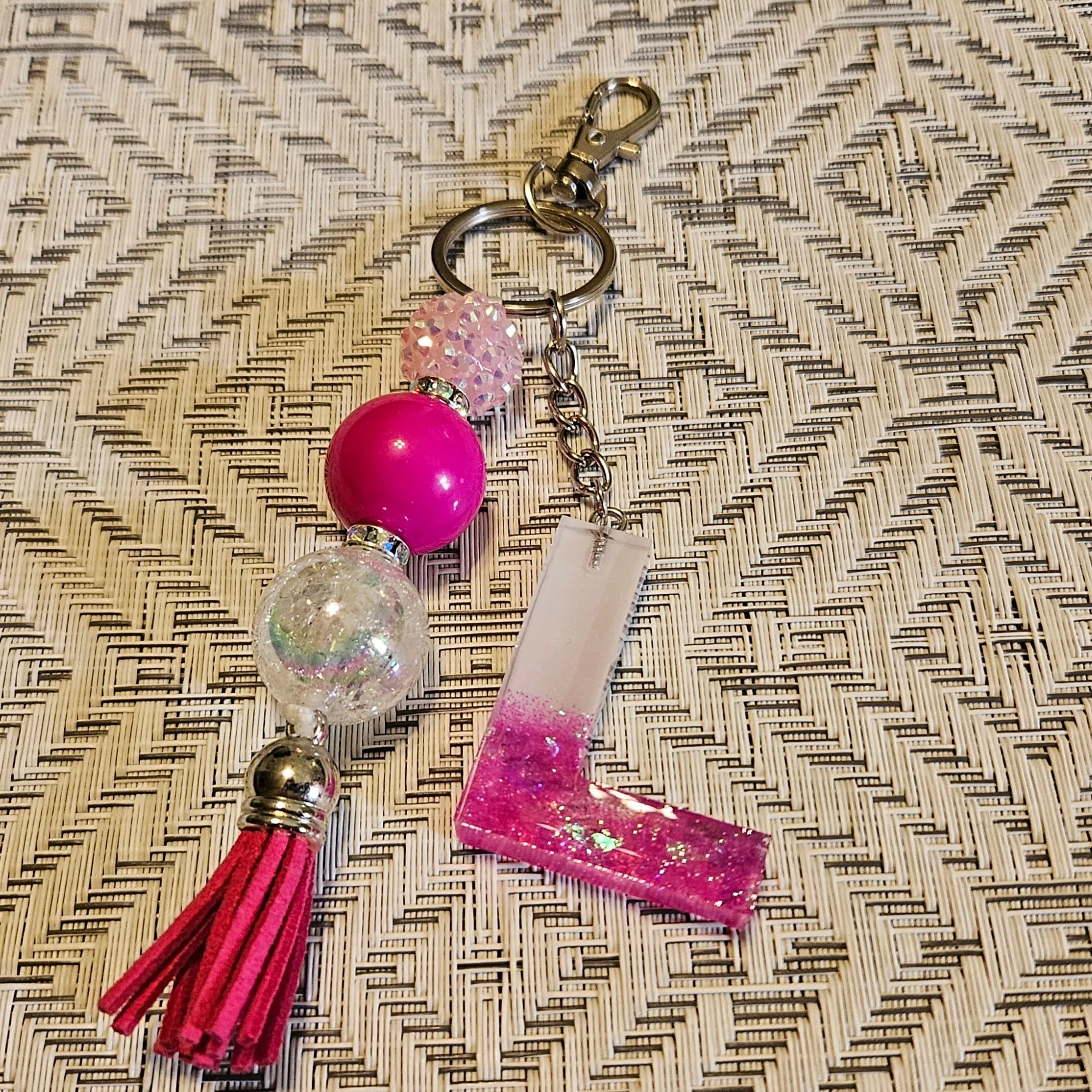 Product image for pink&white L keychain