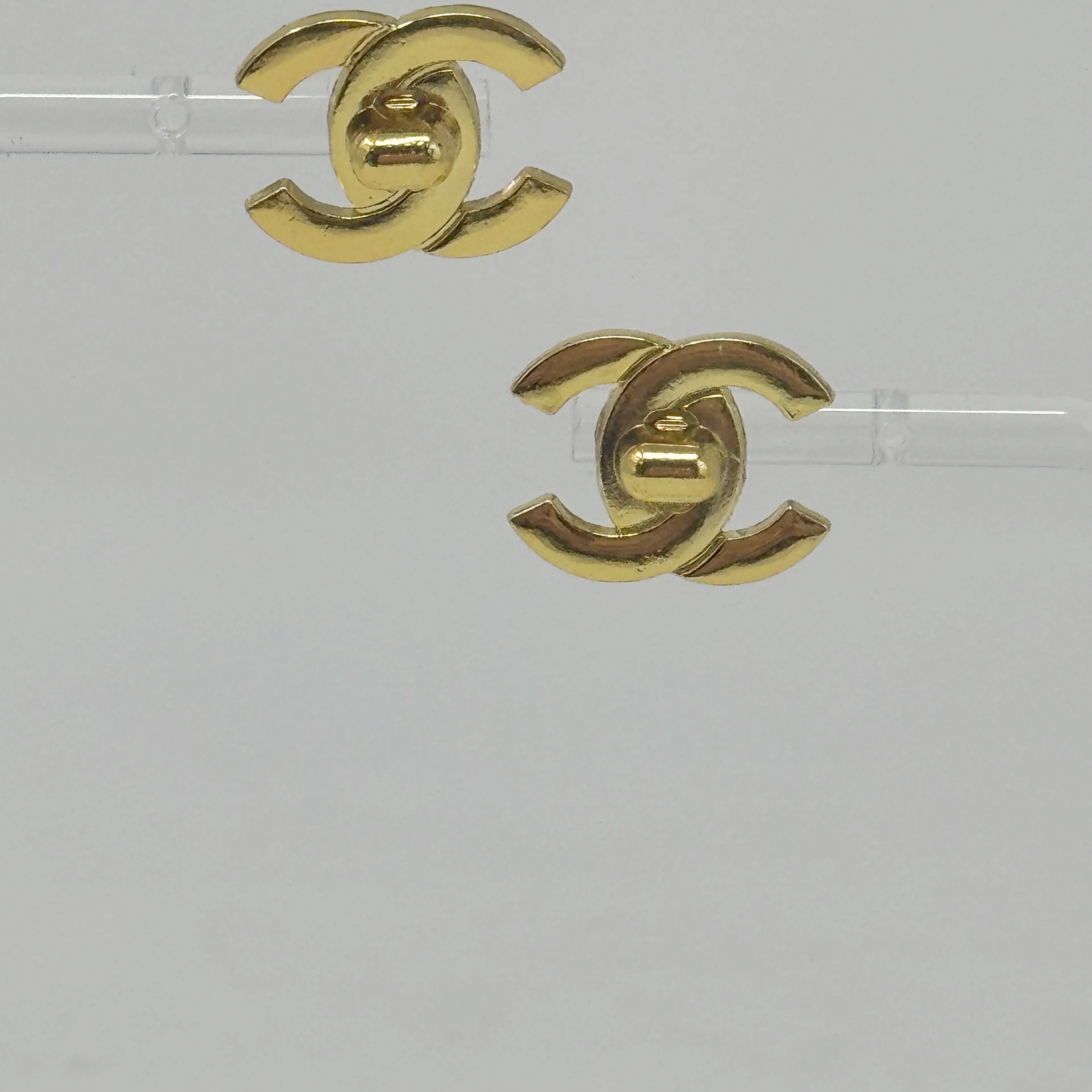 Product image for CHANEL Upcycled Gold Turnlock Studs Earrings
