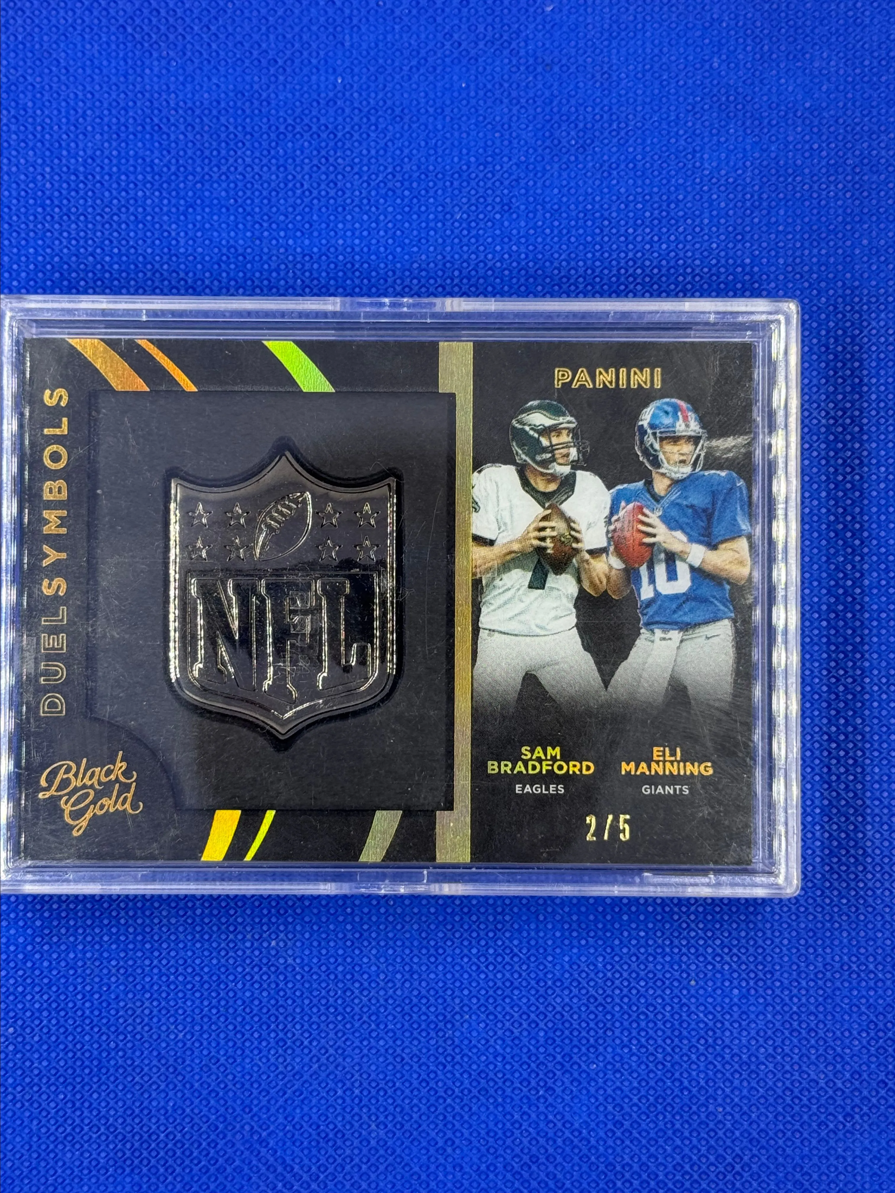 Product image for SAM BRADFORD & ELI MANNING DUEL SYMBOLS 2/5 (Refactor) Panini Black Gold