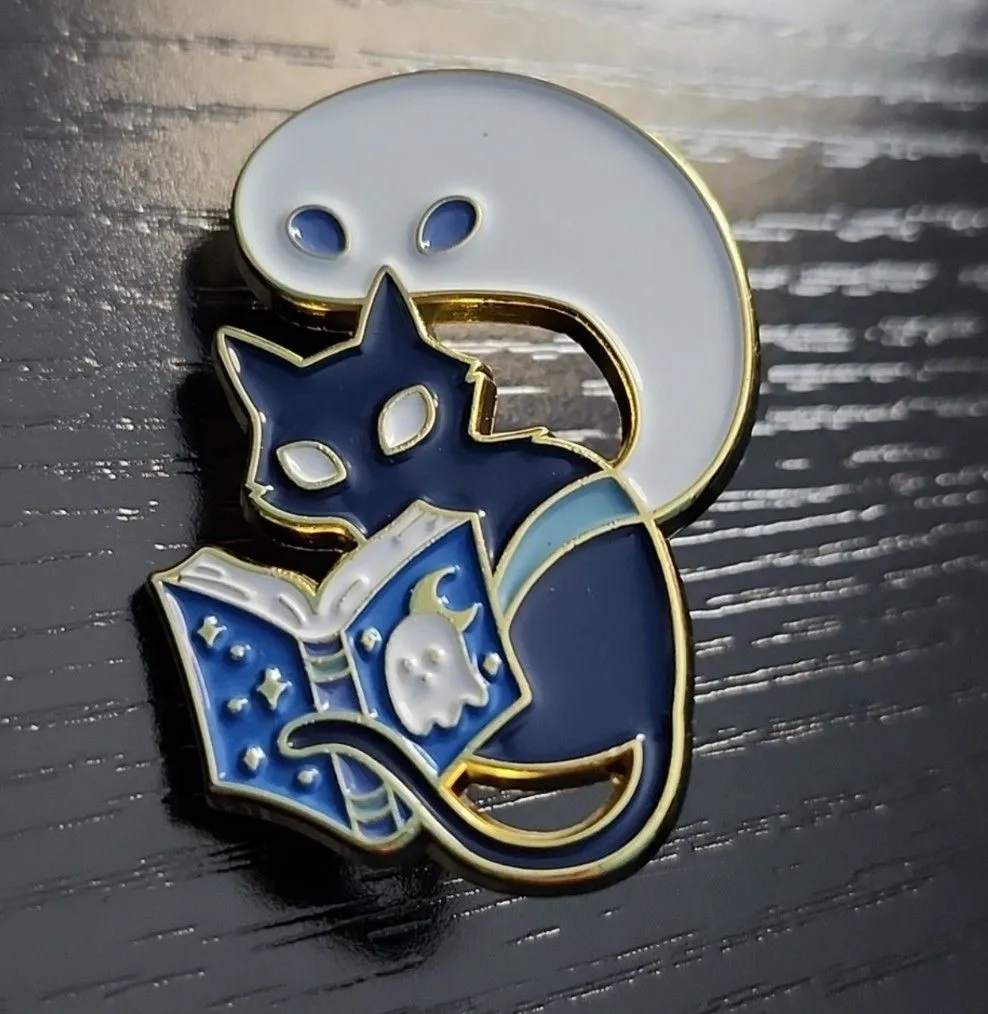Product image for Black Cat Reading Scary Story Enamel Pin