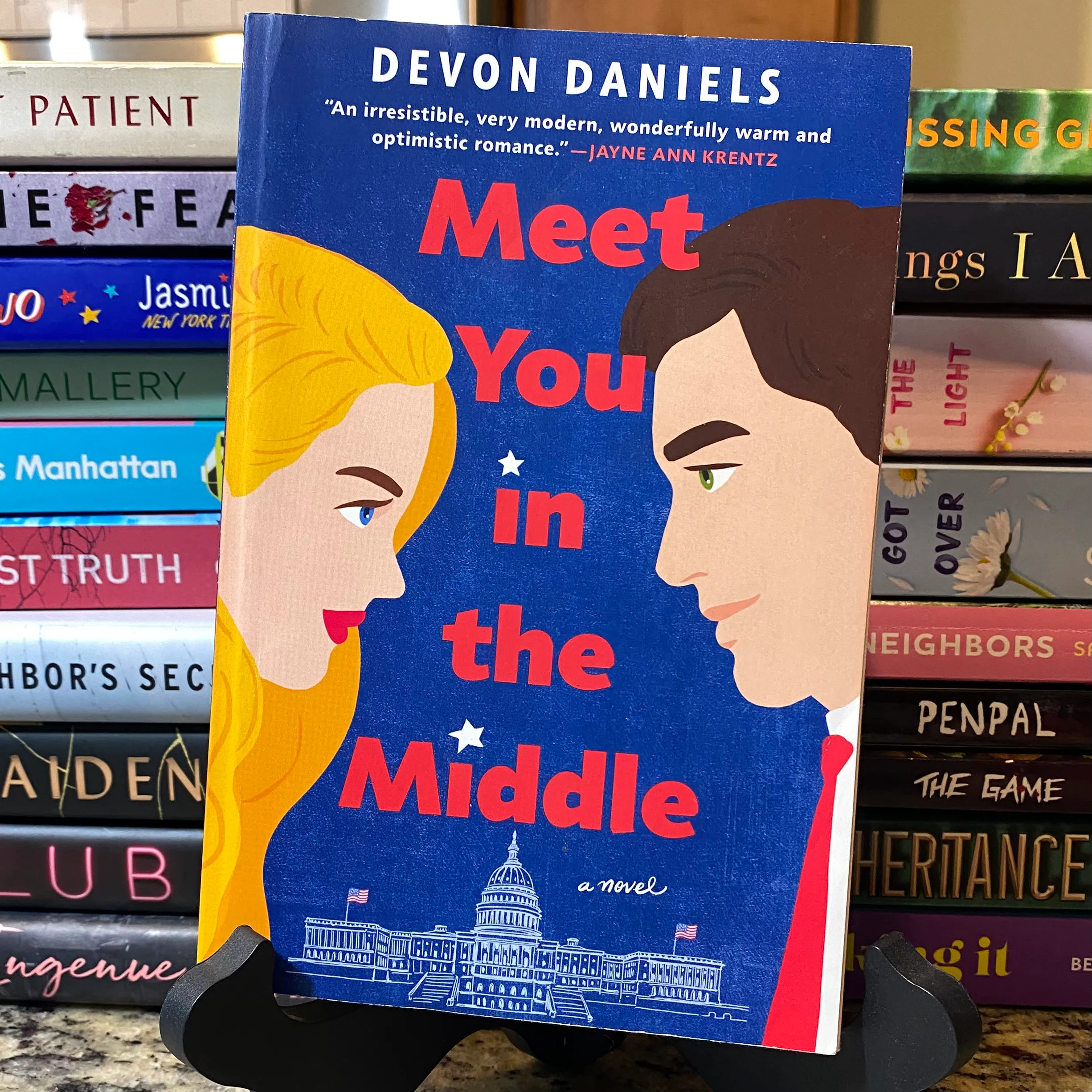 Product image for Meet You in the Middle by Devon Daniels