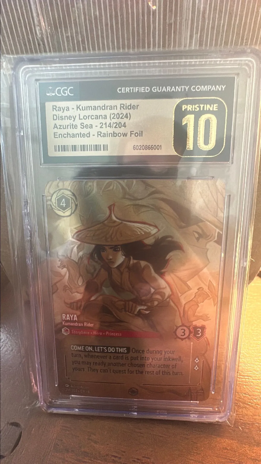 Product image for Raya - Kumandran Rider (Enchanted) #214 - 2024 Lorcana Azurite Sea - CGC Pristine 10