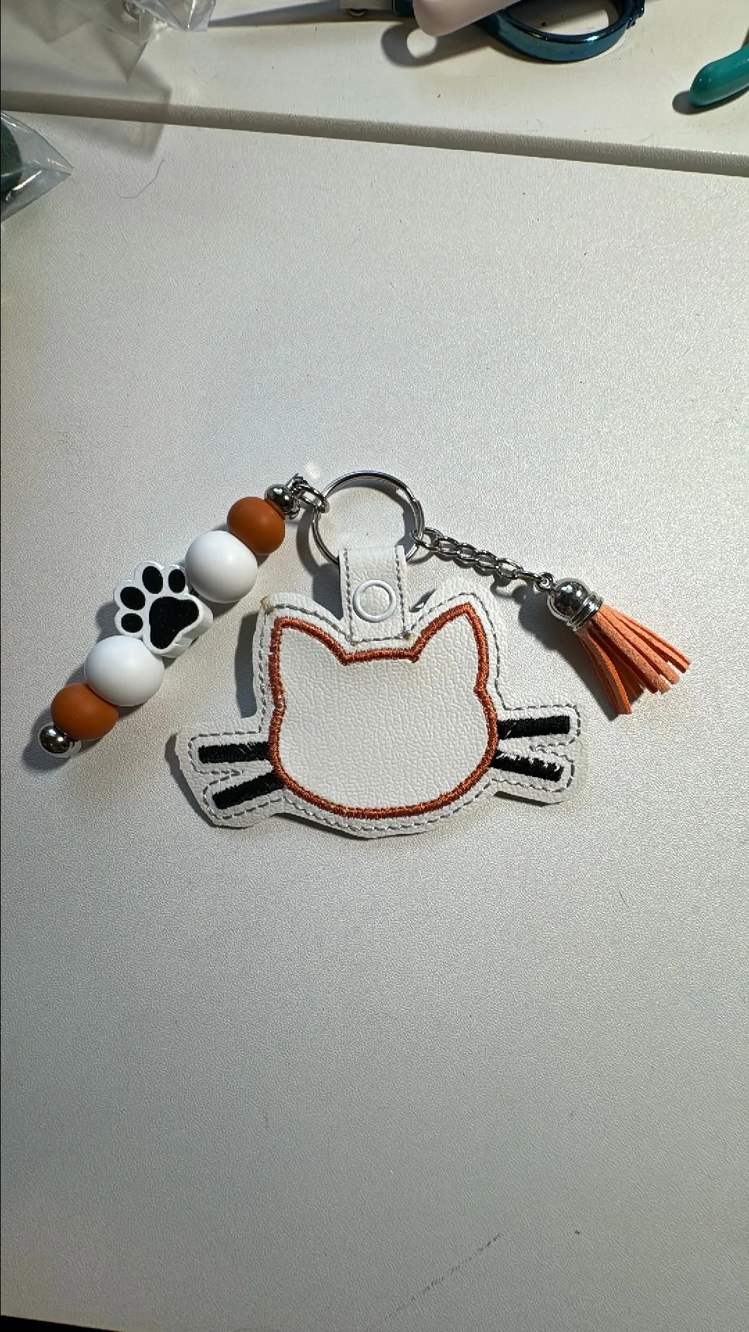 Product image for Cat embroidered keychain with beads