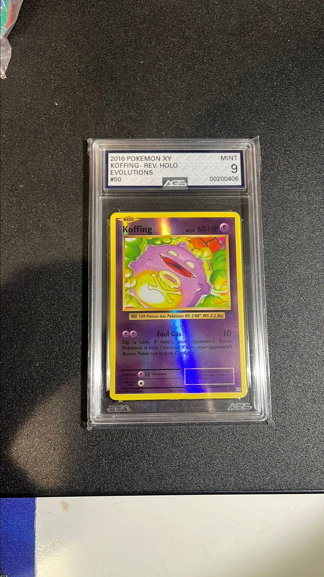 Product image for Koffing Evolutions Reverse Holo AGS 9