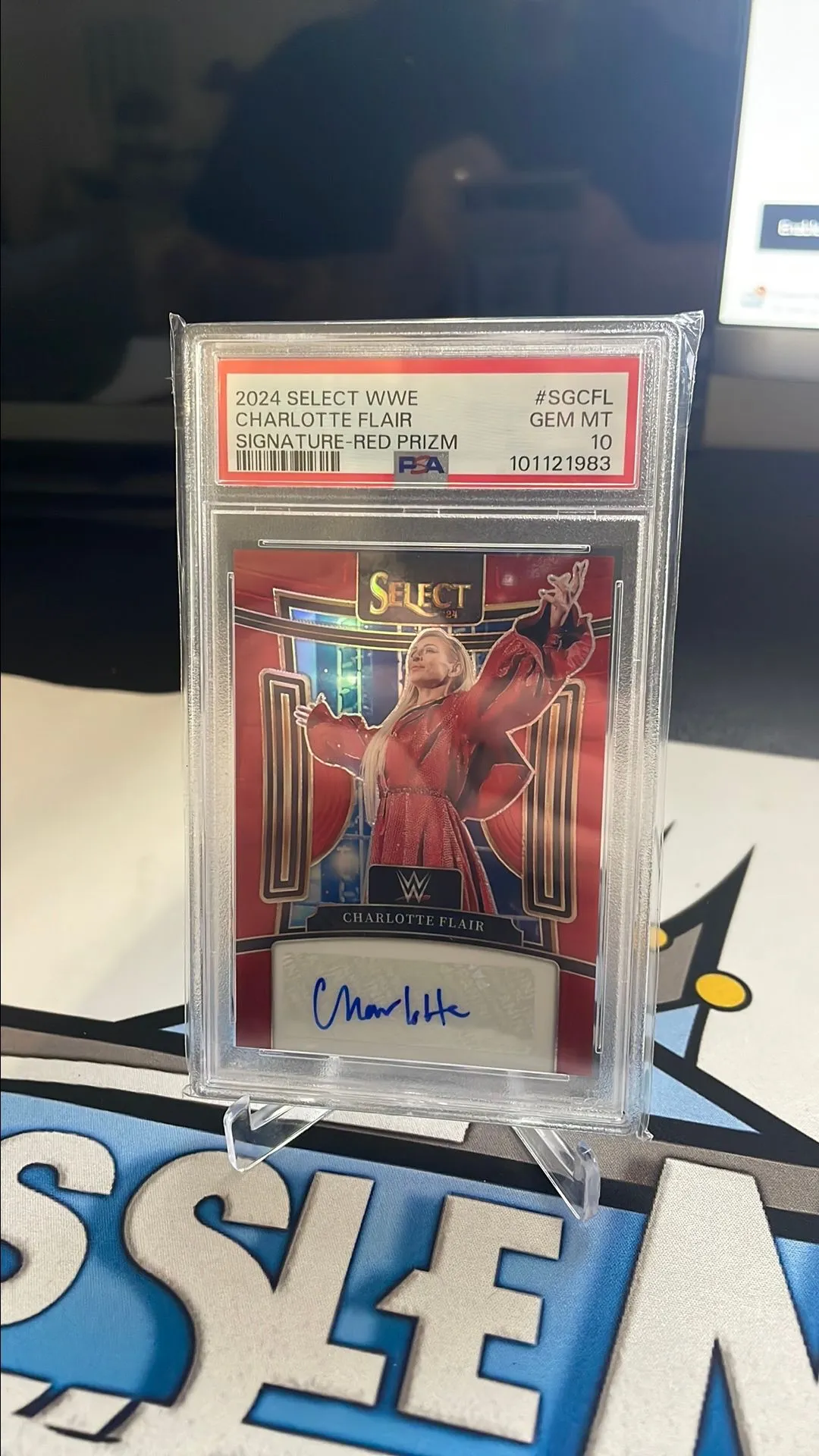 Product image for 2024 Select WWE Charlotte Flair Signature Auto - Red Prizm /99 PSA 10