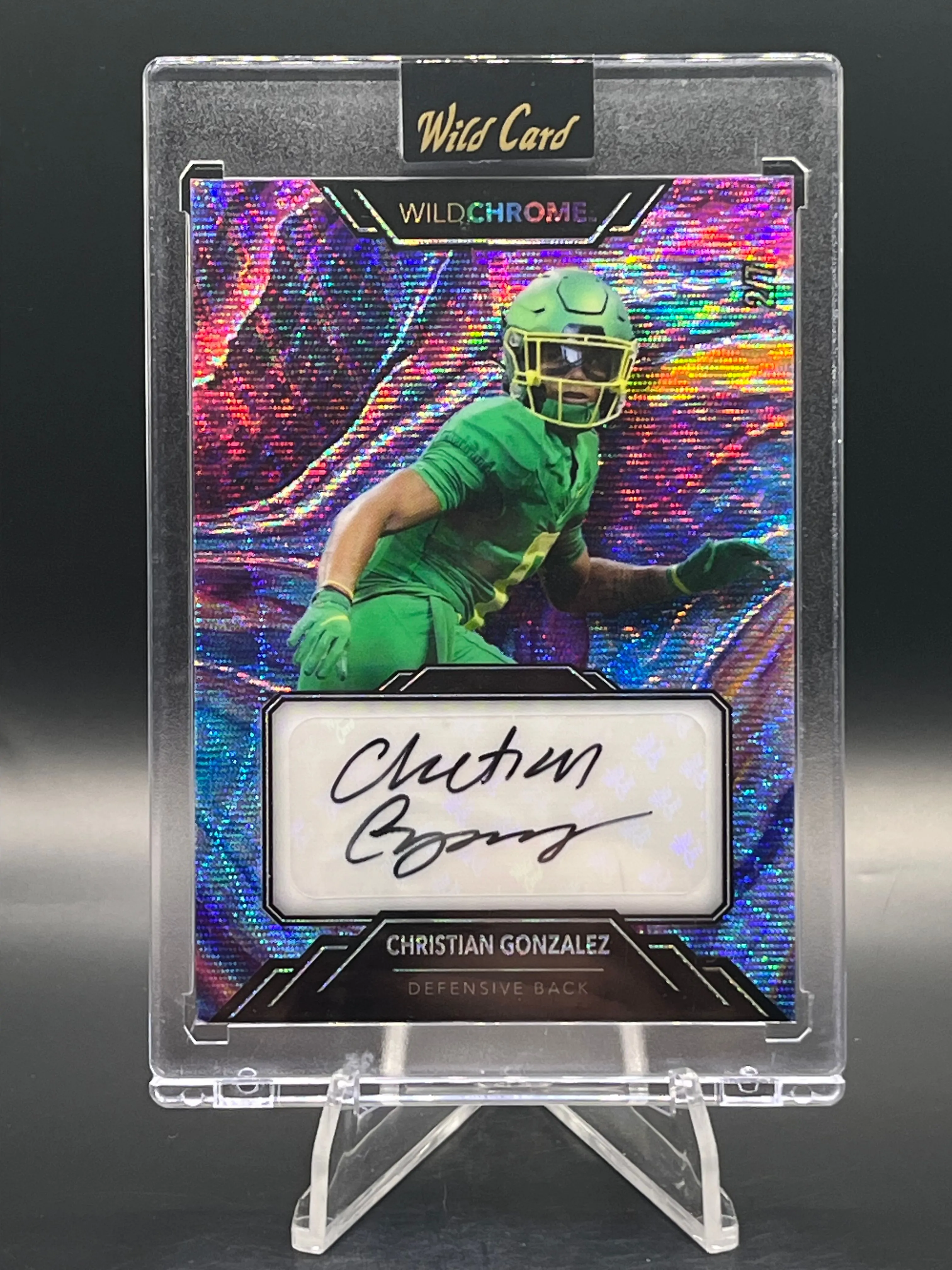 Product image for 2/7 Christian Gonzalez Oregon / Patriots DB 2023 Wild Card WildChrome WildLiquid Auto Purple Wave