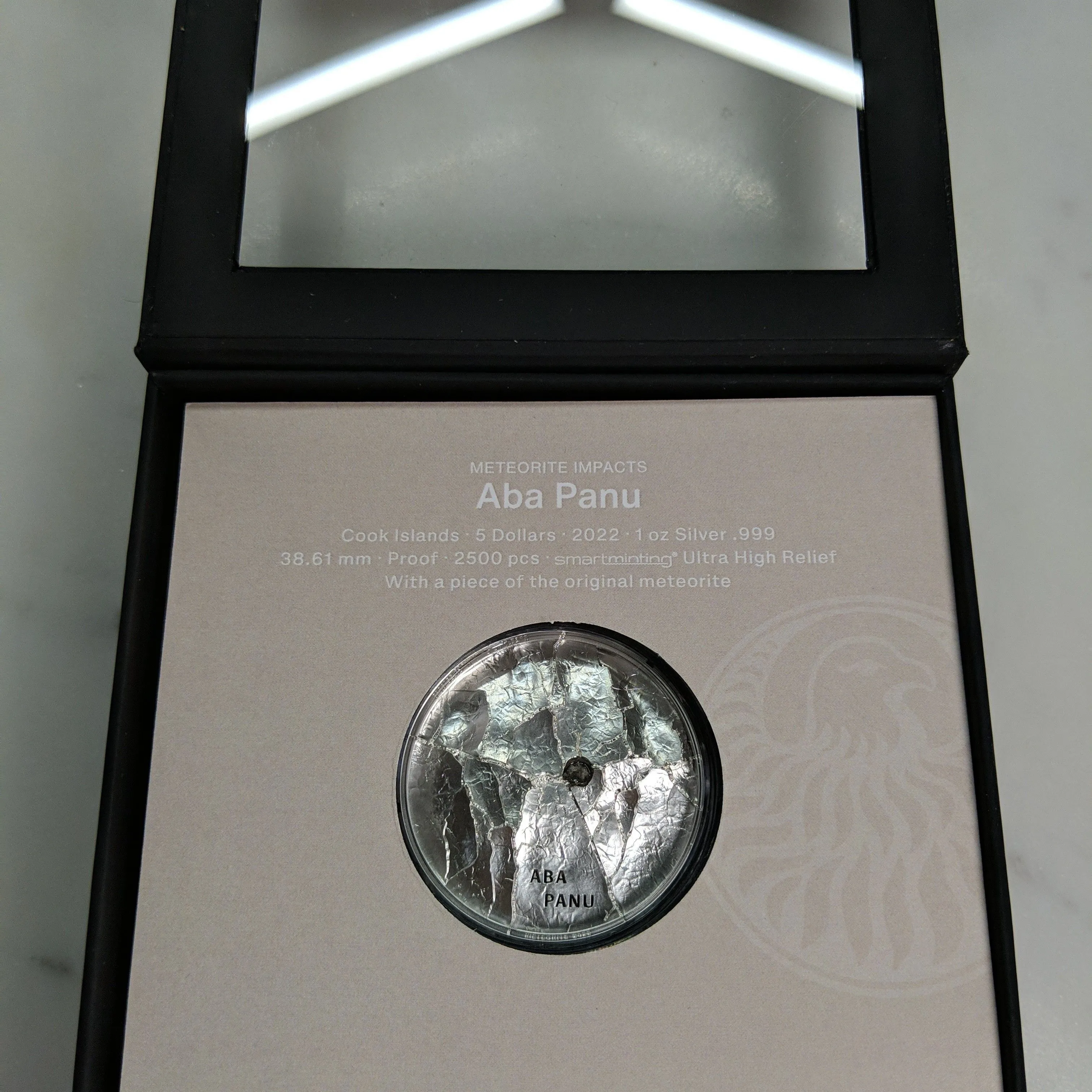 Product image for Silver Meteorite Coin 2022 CIT Cook Islands Impacts Aba Panu .999 1 oz. $5 Coin with Box and COA