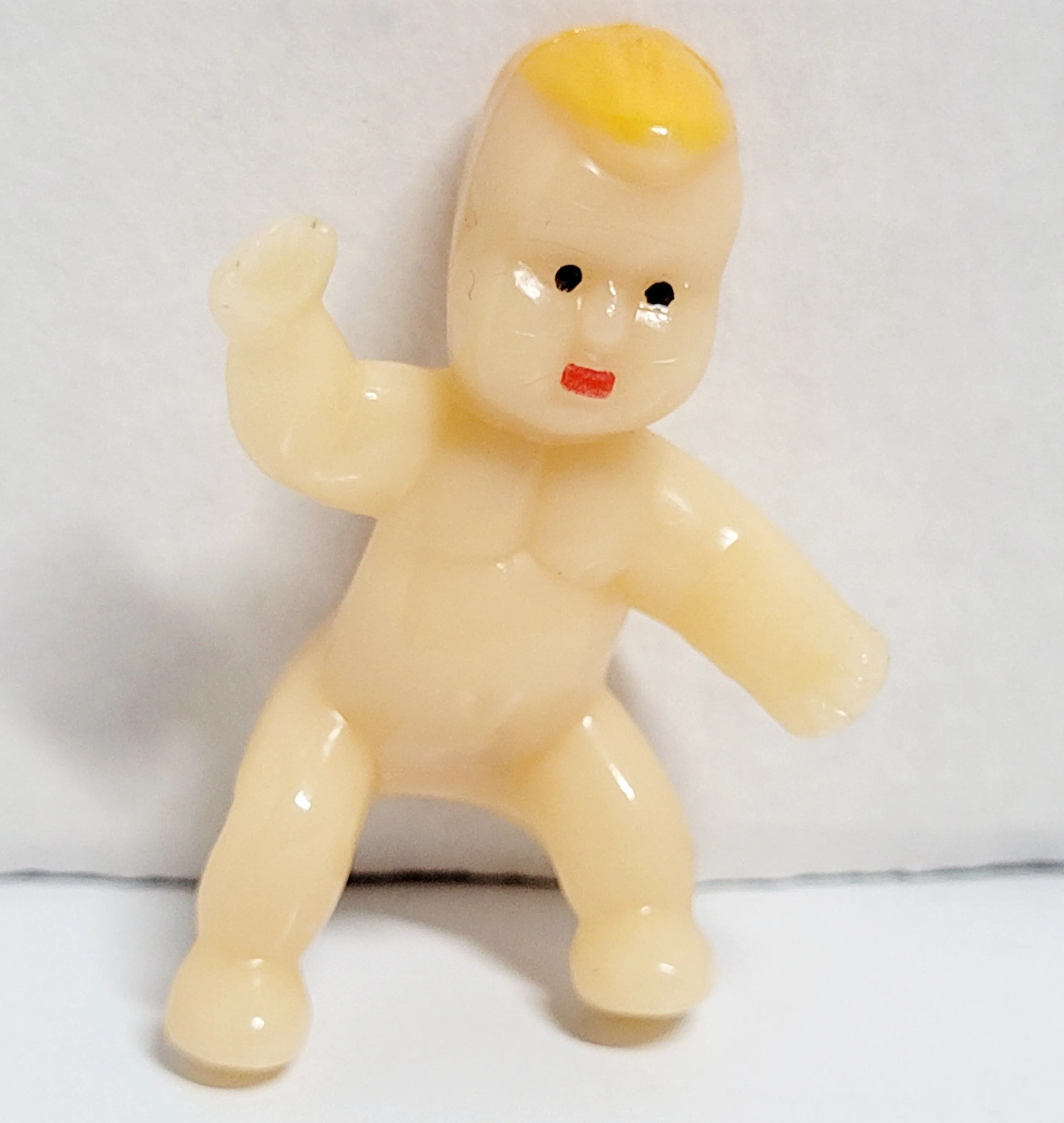 Product image for "King Cake Baby" 1" Miniature Plastic Baby Mardi Gras Celebration Traditions. The image shows a mini