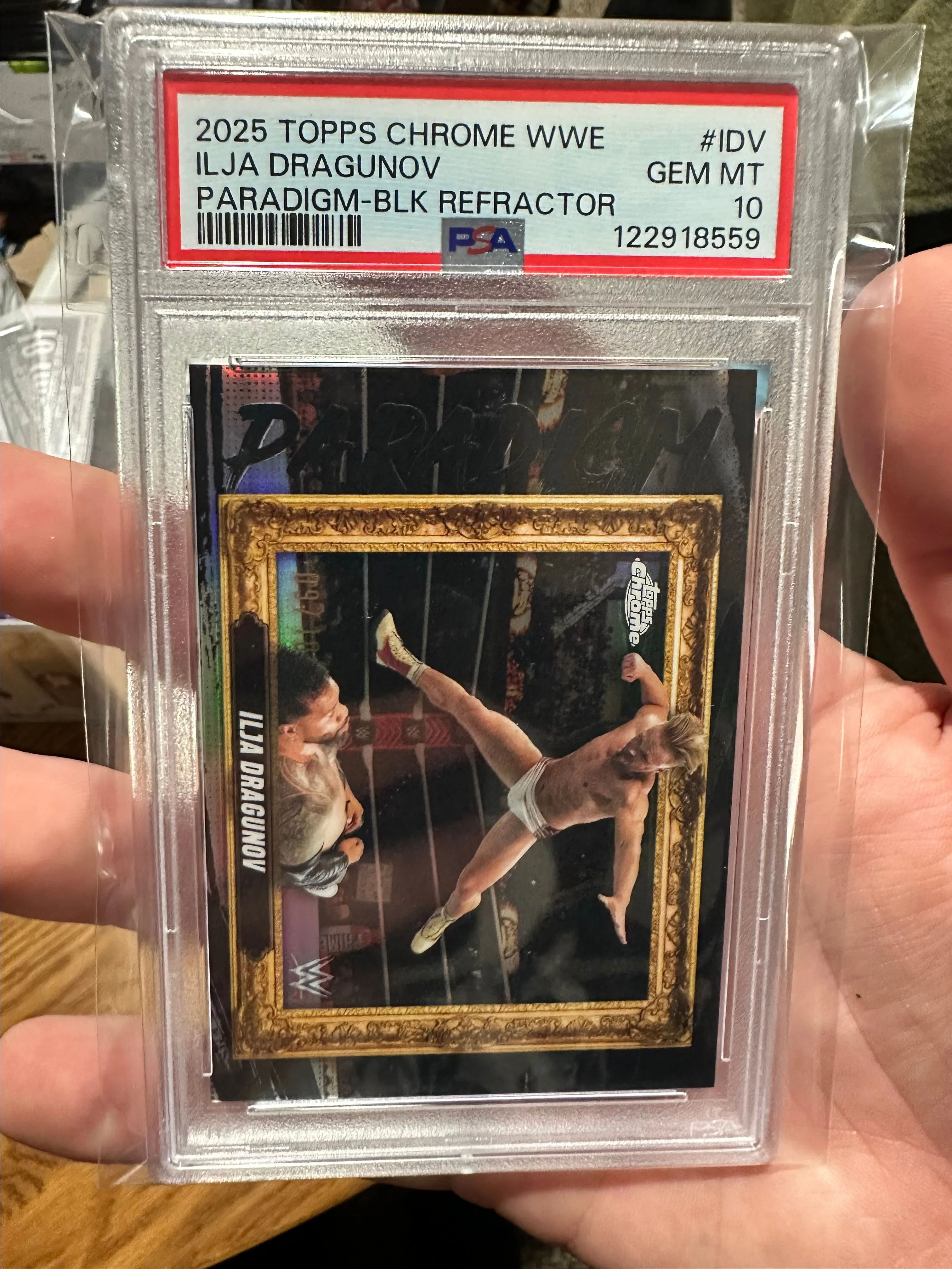 Product image for 2025 TOPPS CHROME WWE - ILJA DRAGUNOV - BLACK REFRACTOR - PSA 10 !!