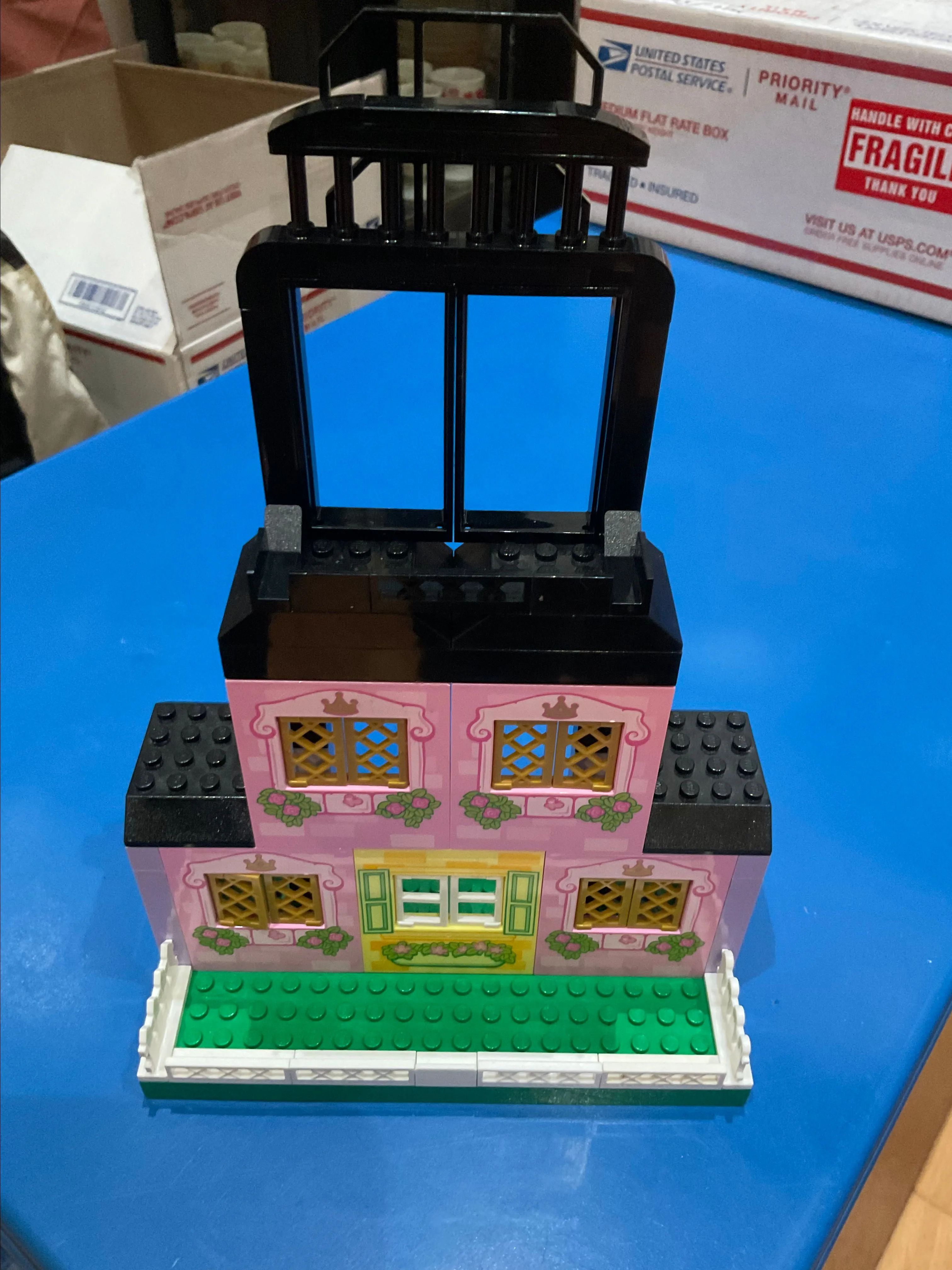 Product image for 2tiered Lego card holder display pink house