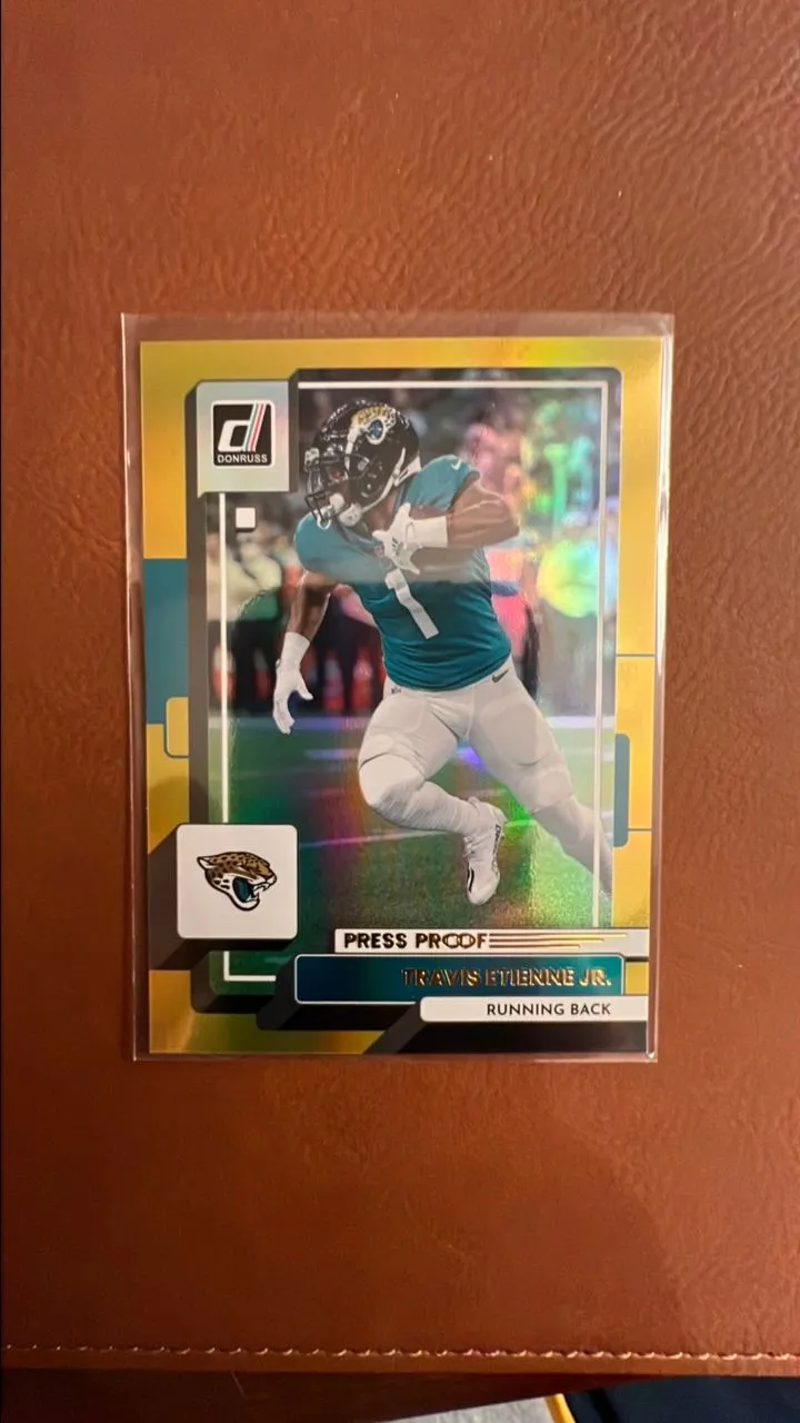 Product image for Travis Etienne Jr - HOLO PREMIUM STOCK - JAGUARS