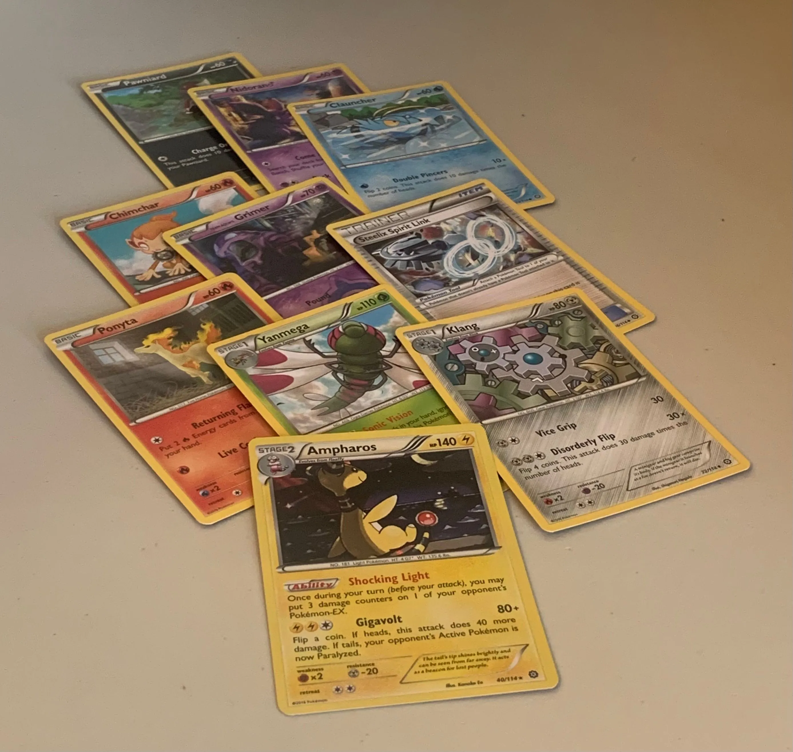 Product image for Lot Of 10 Pokémon Cards Including Foil Card. 9 Regular And 1 Foil Card