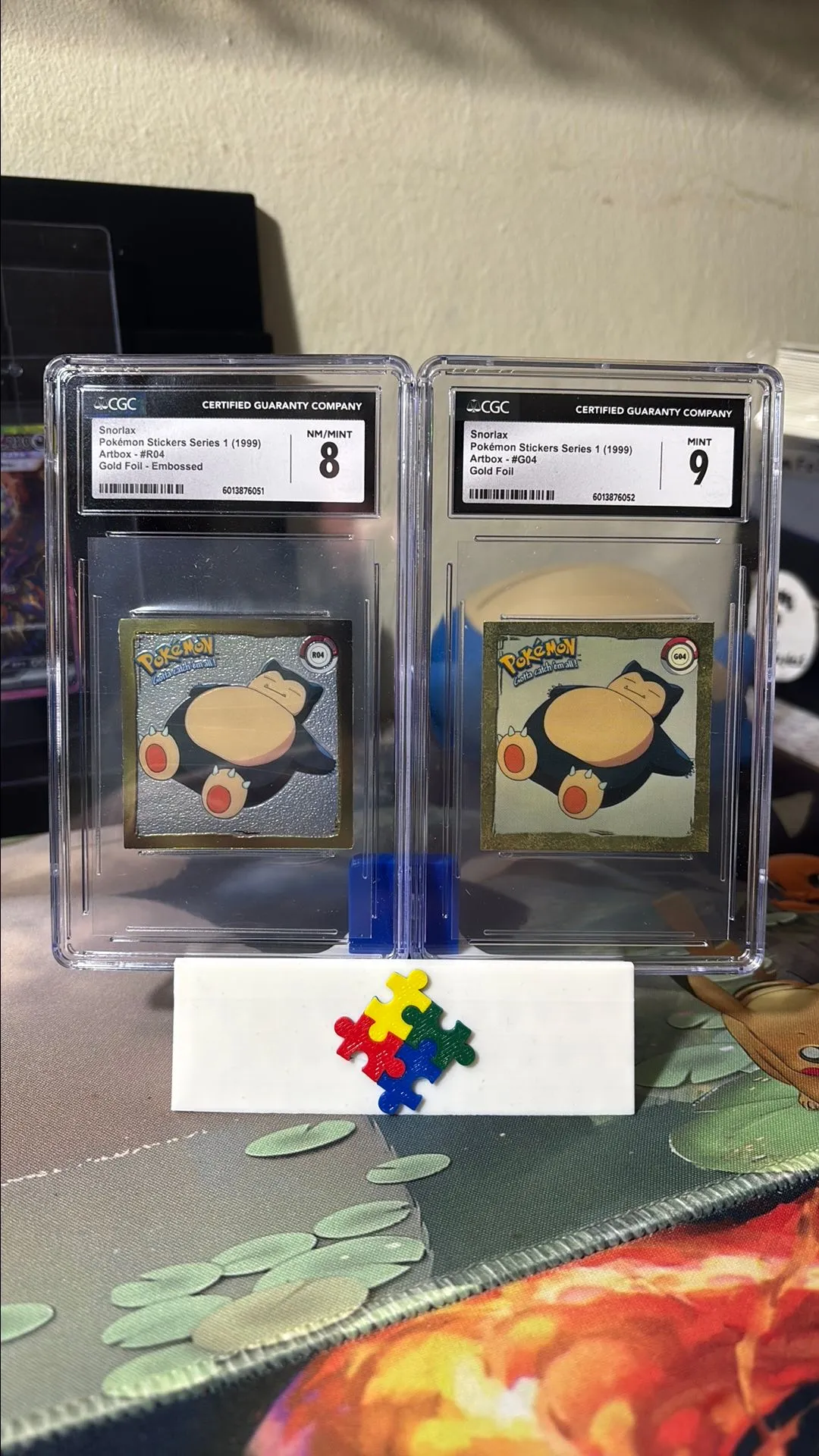 Product image for 1999 Snorlax Artbox R04 and G04 Gold Foil Stickers CCGC NM/Mint 8 and Mint 9