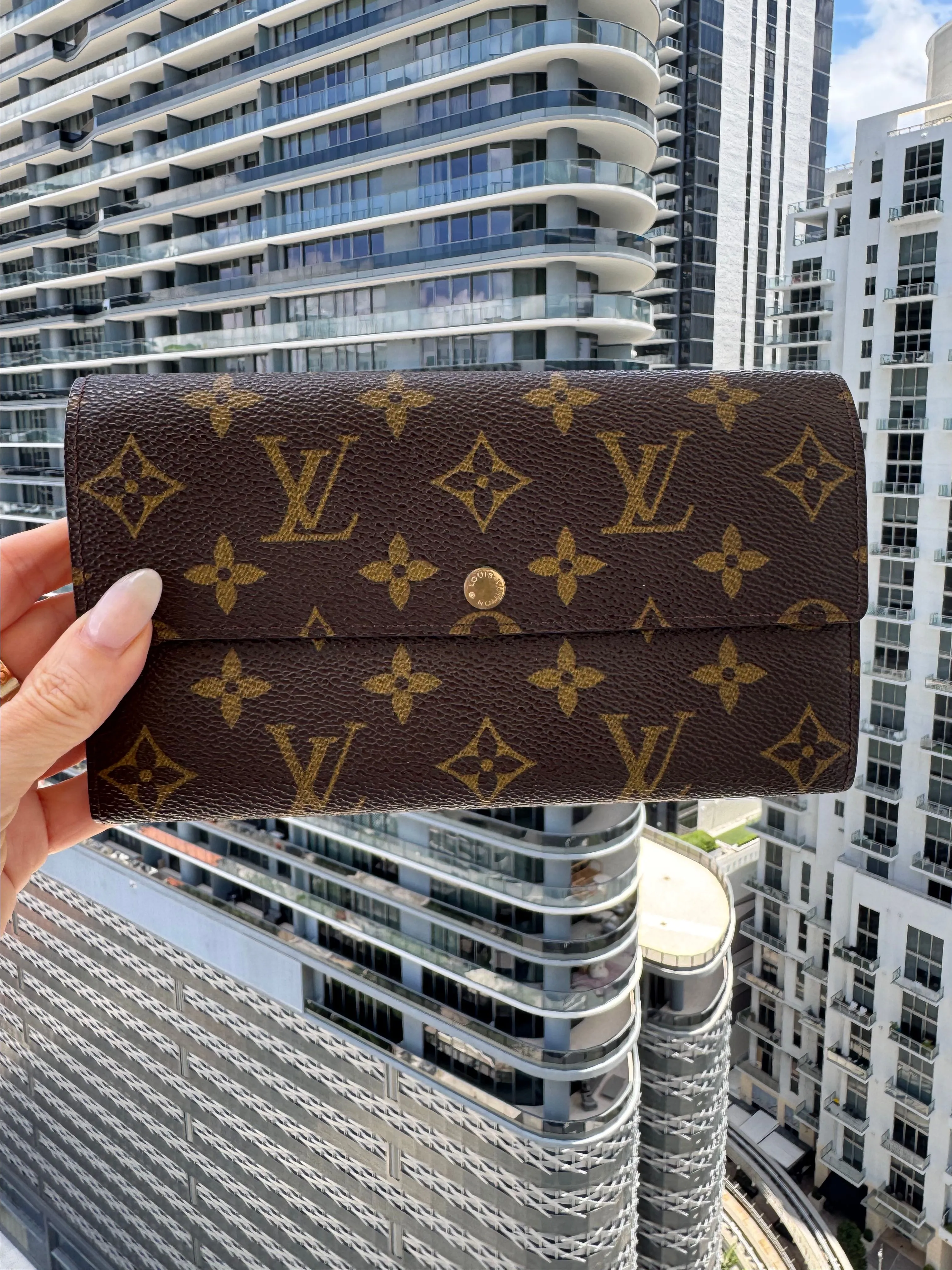 Product image for 1. Louis Vuitton Monogram Sarah Wallet