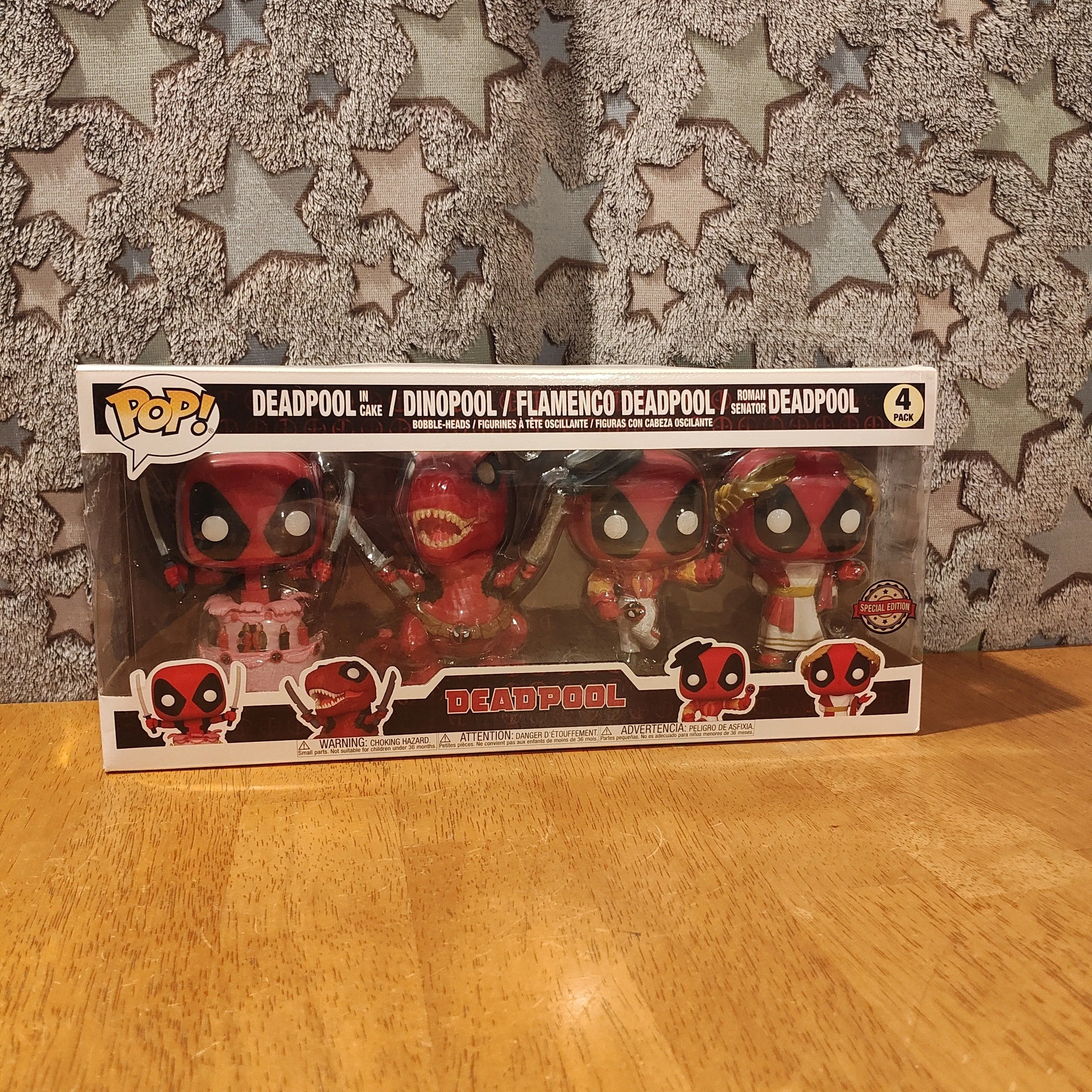 Product image for Deadpool in Cake / Dinopool /  Flamenco Deadpool / Roman Senator Deadpool - 4 Pack