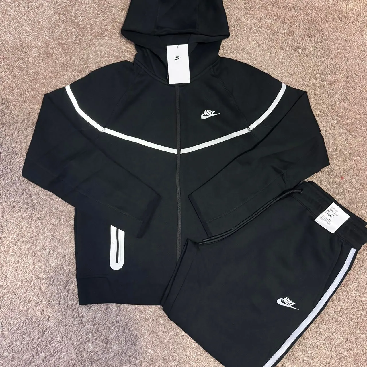 nike tech fleece tracksuit in black