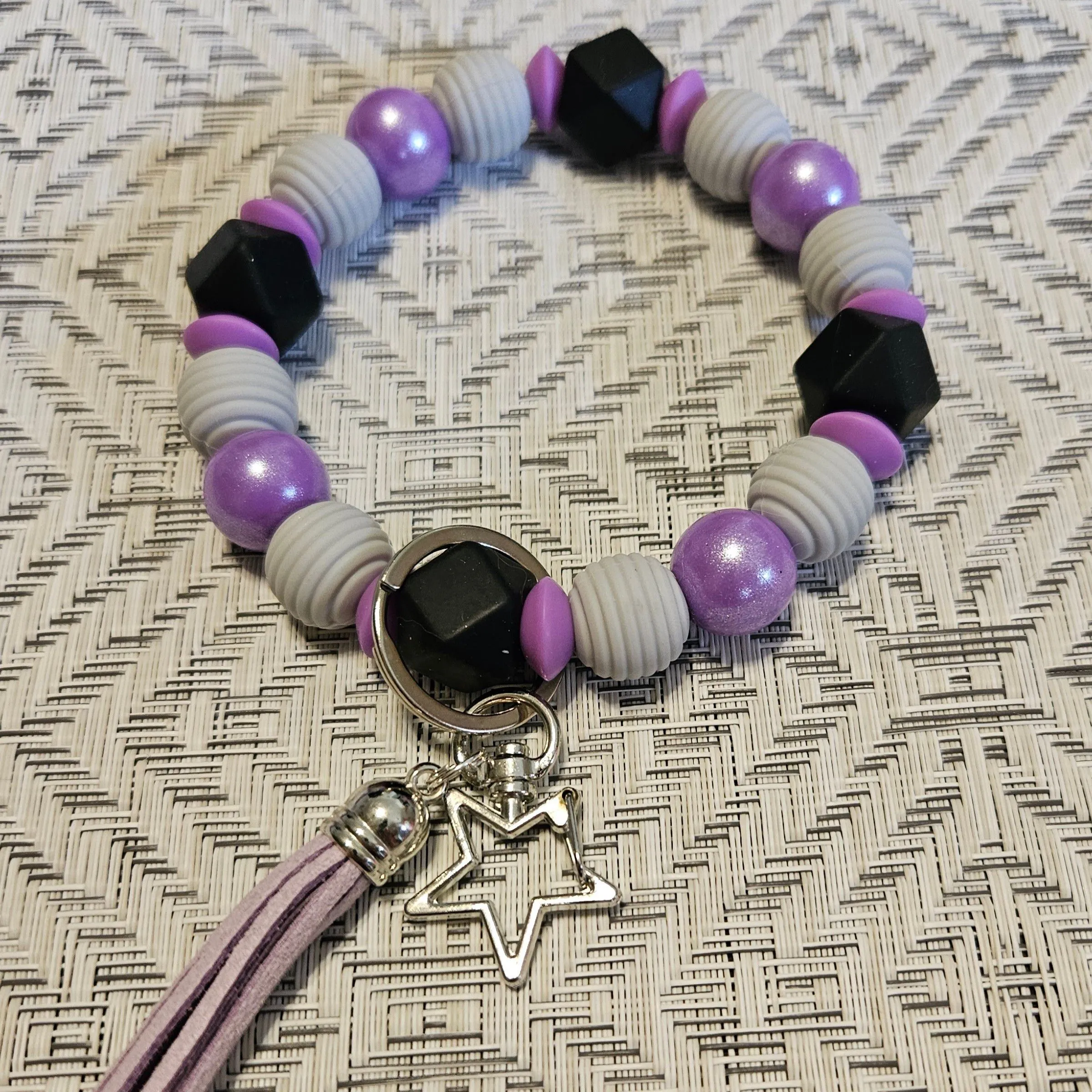 Product image for purple & grey wristlet