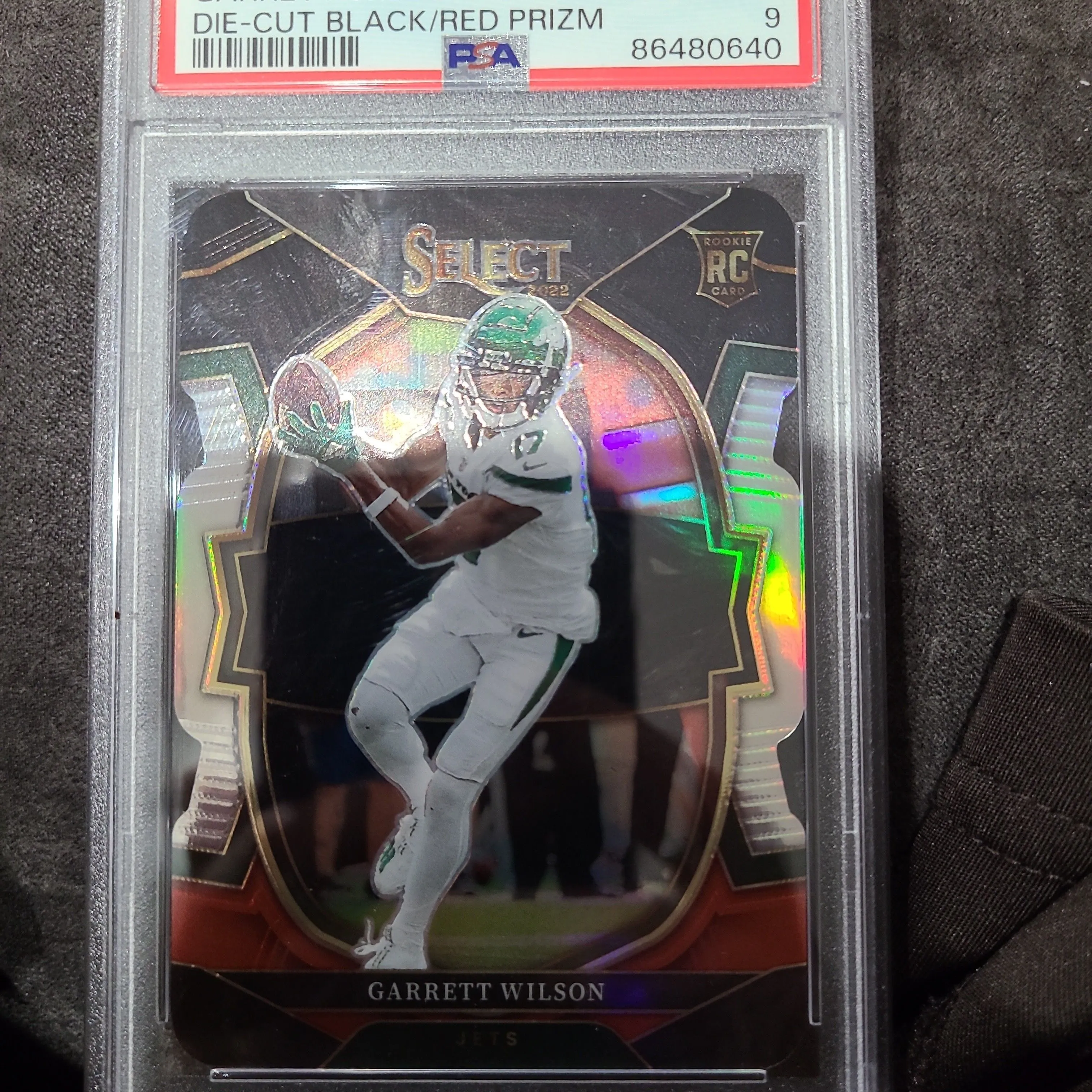 Product image for 2022 Panini Select Garrett Wilson 88 Die-Cut Black/Red Prizm PSA MINT 9