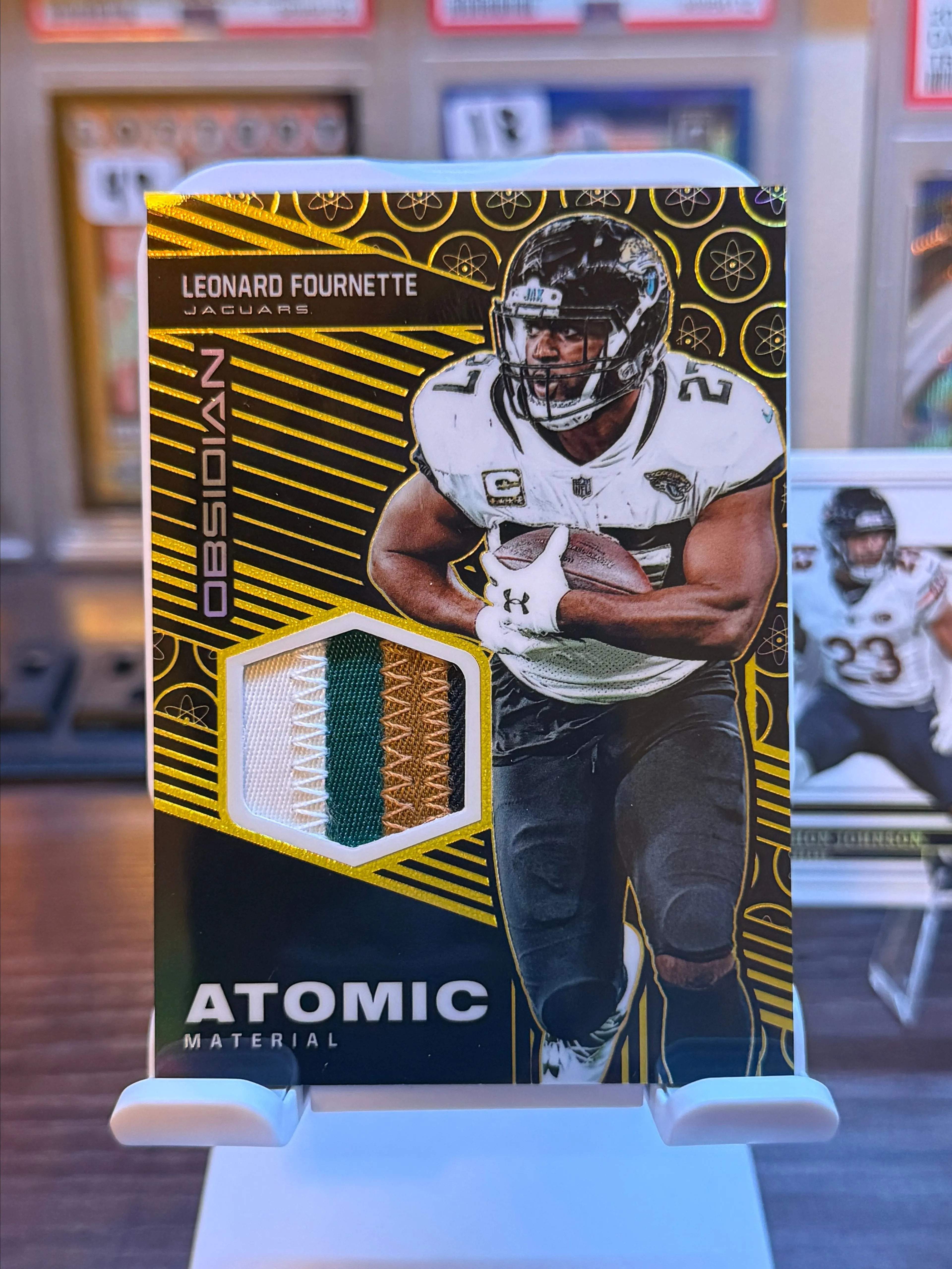 Product image for 2019 Obsidian Atomic Material Leonard Fournette Gold /10 SSP Patch