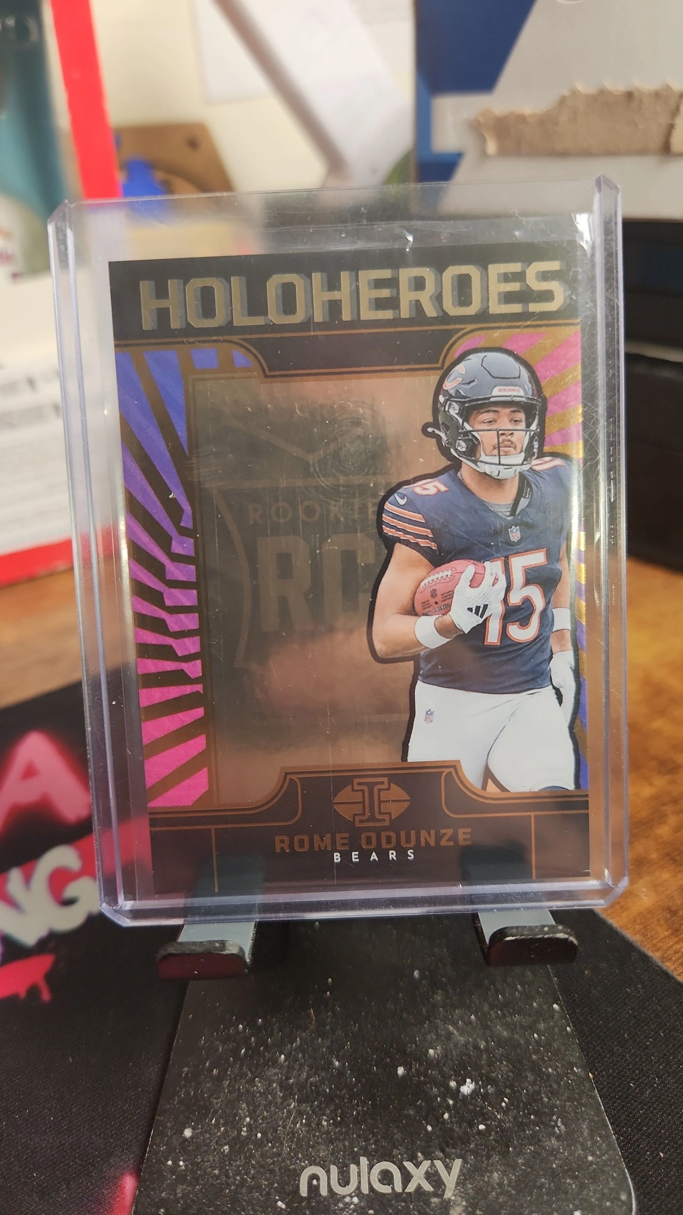 Product image for 2024 Panini Illusions Holoheroes #15 Rome Odunze NFL Trading Card Case Hit #1 Bears 