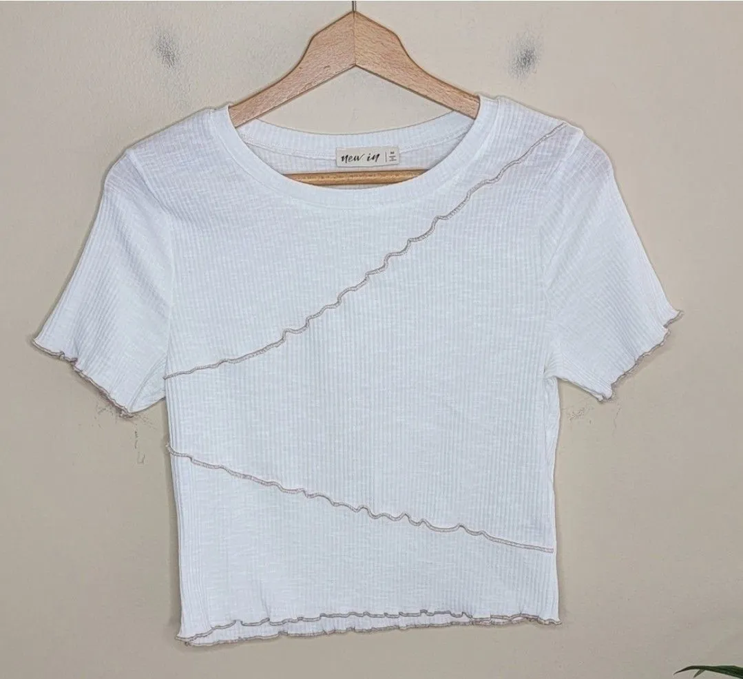 Product image for 024. New In | White Ribbed Cropped Short Sleeve Tee with Ruffle Lettuce Detail