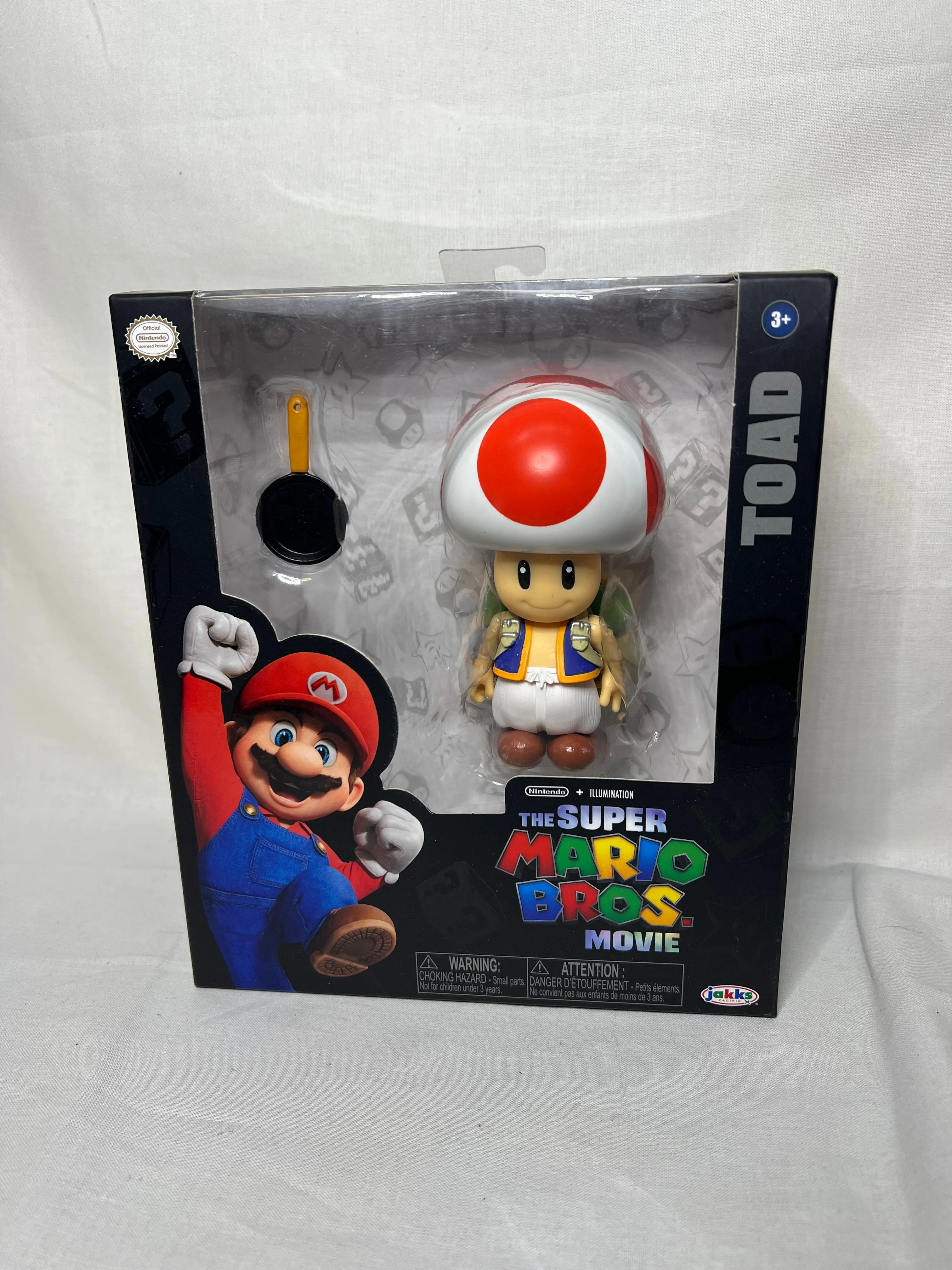 Product image for Nintendo The Super Mario Bros. Brothers Movie Toad Figure with Frying Pan 2023