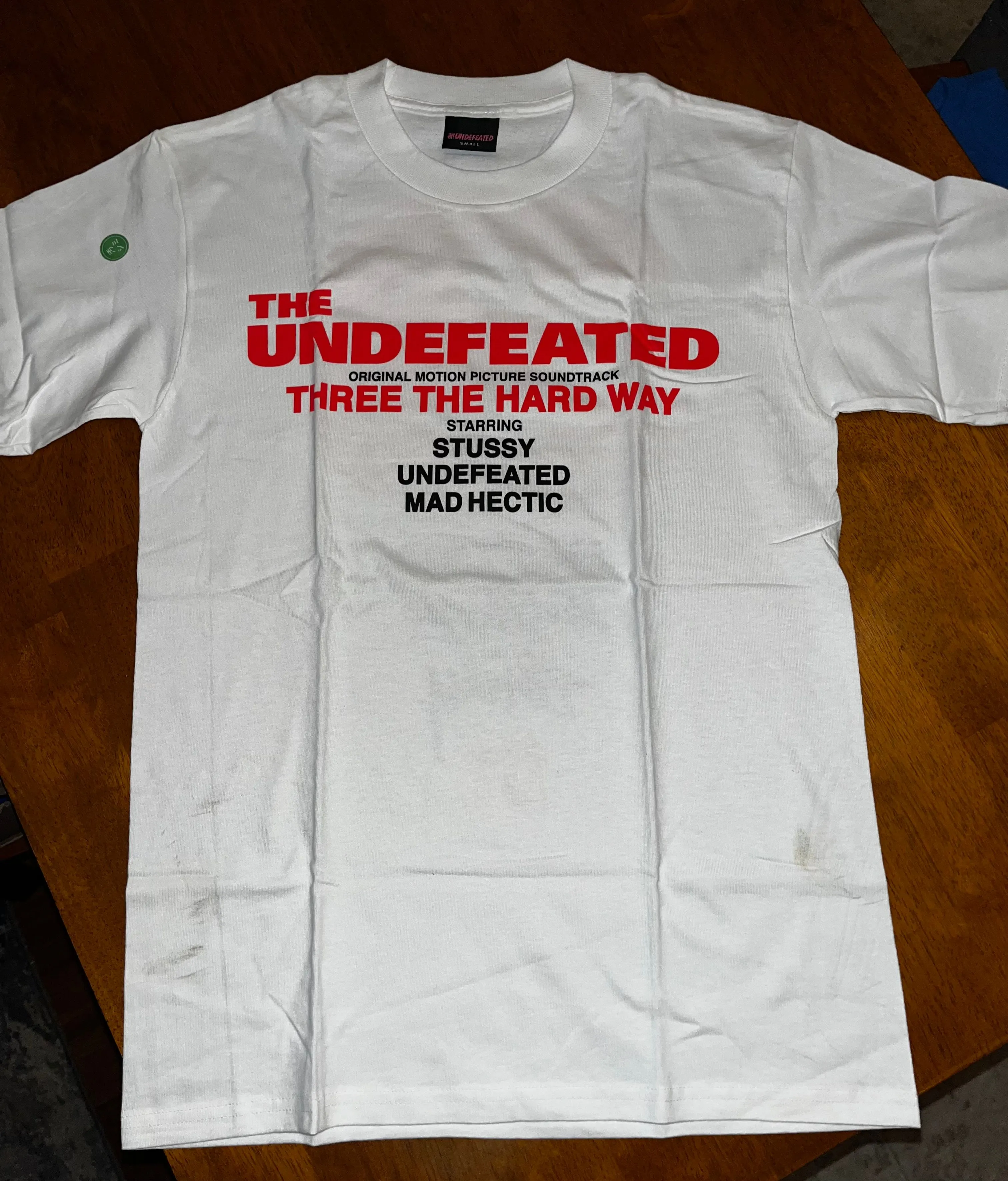 Product image for Stussy Threeway Tee, size Small (with flaws)