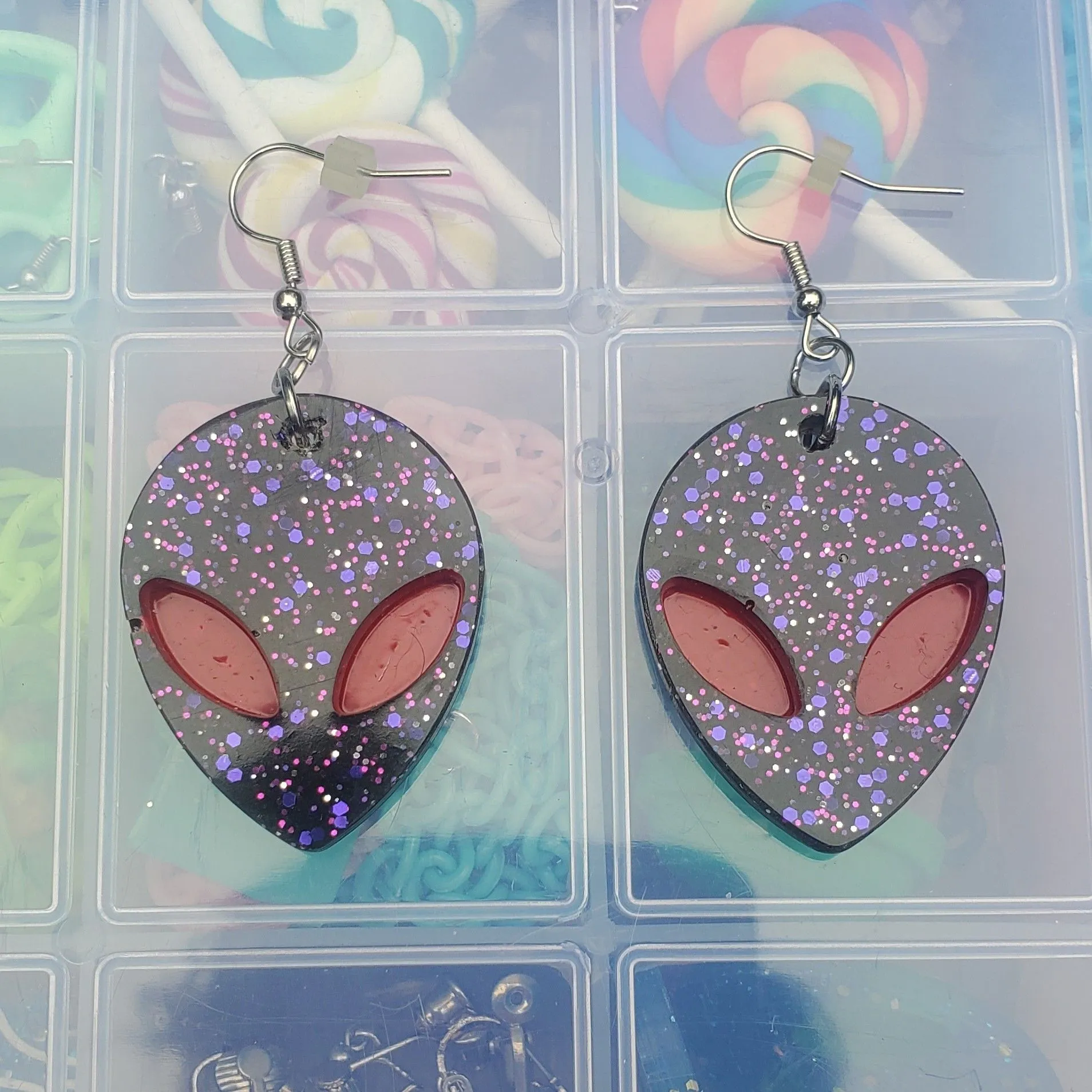 Product image for Purple Glittery Alien Earrings
