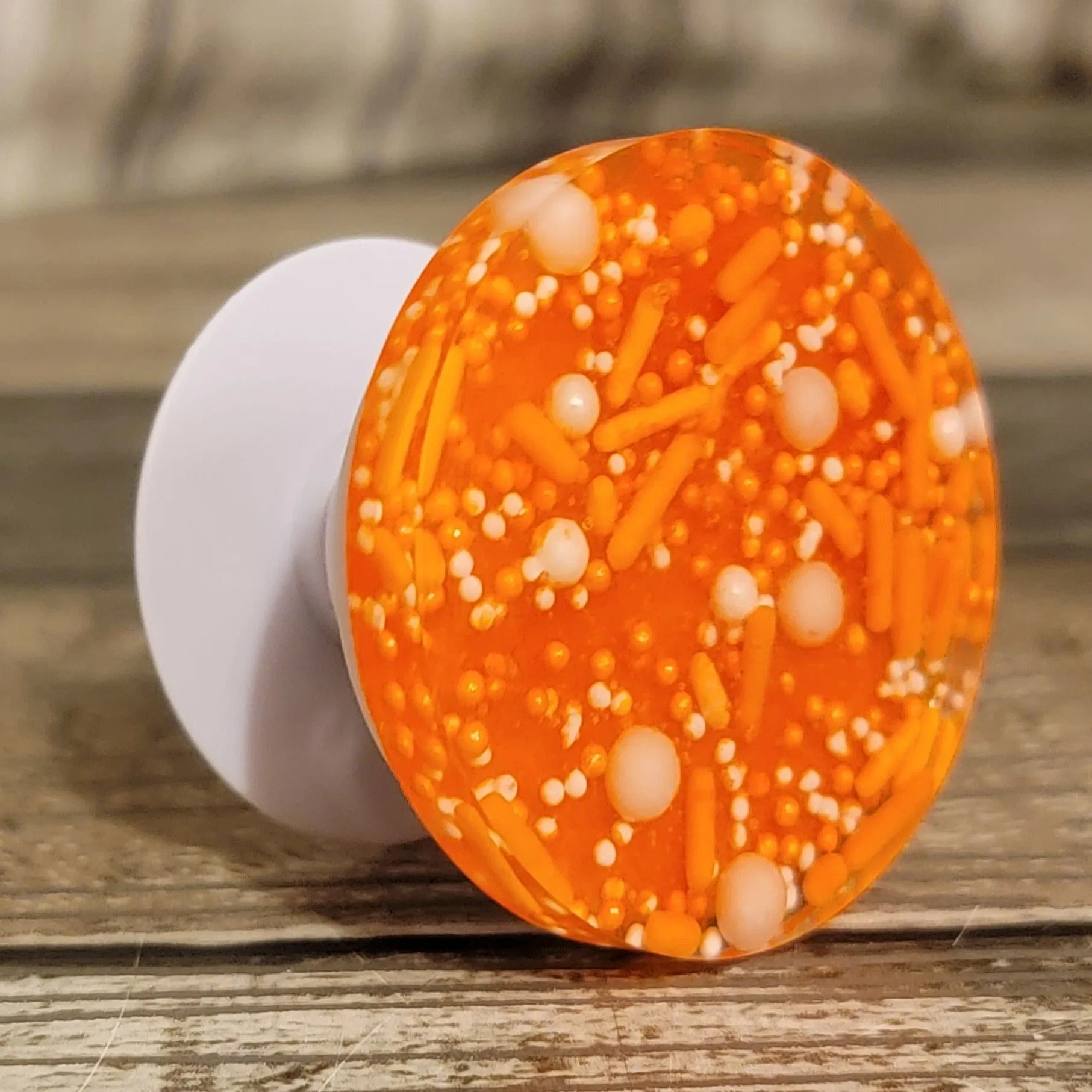 Product image for Orange Sprinkles Phone Socket/Holder