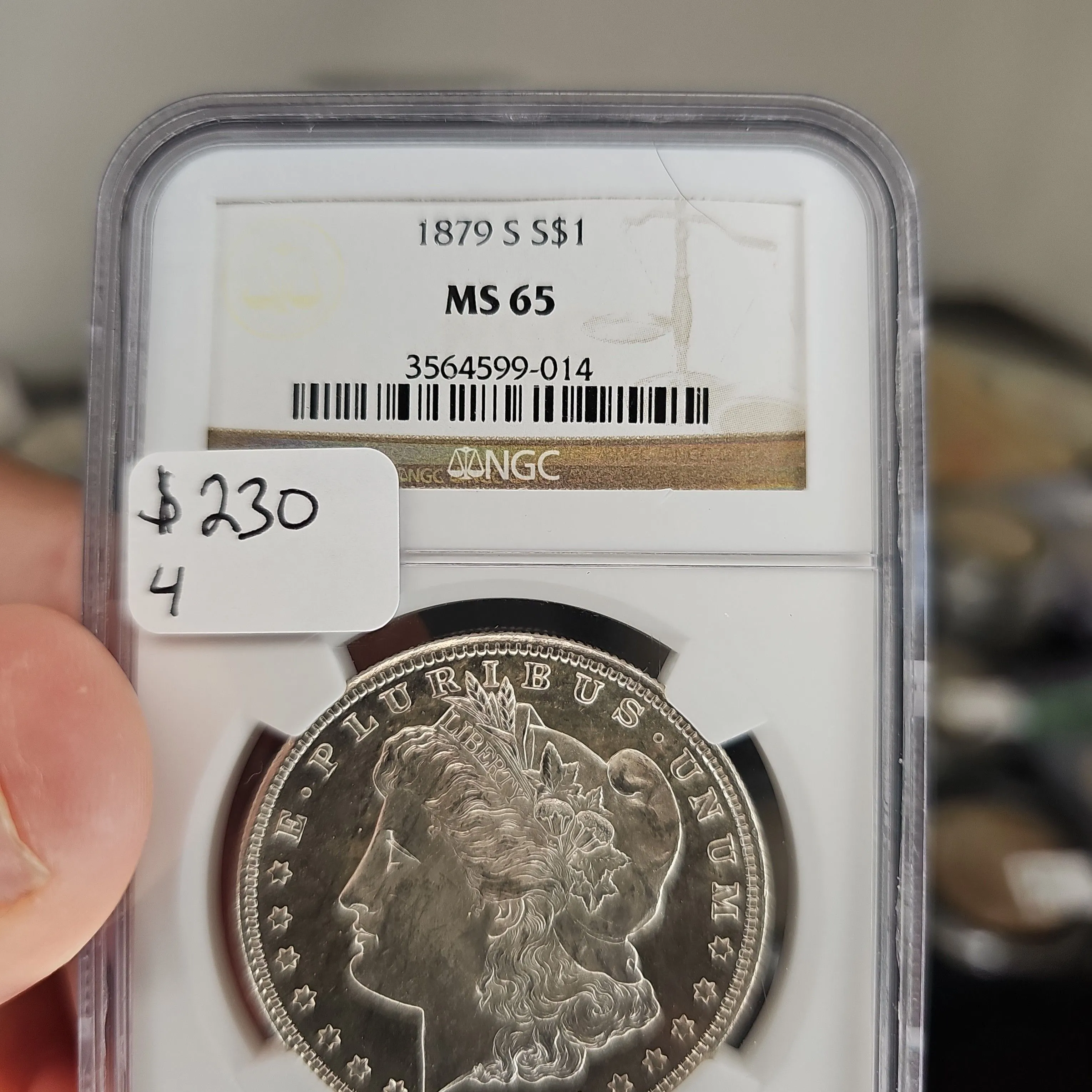 Product image for 1879 s ms65 morgan dollar