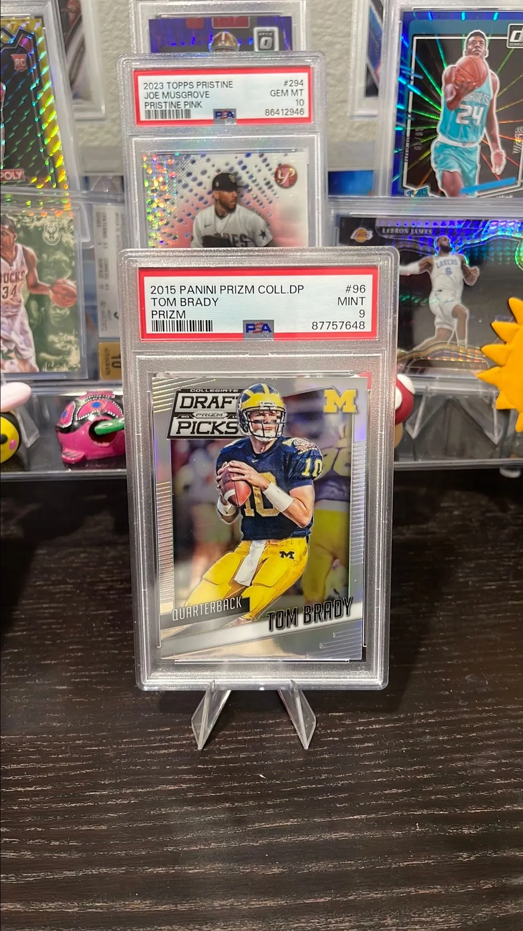 Product image for Tom Brady Silver Prizm Collegiate Draft Picks PSA 9