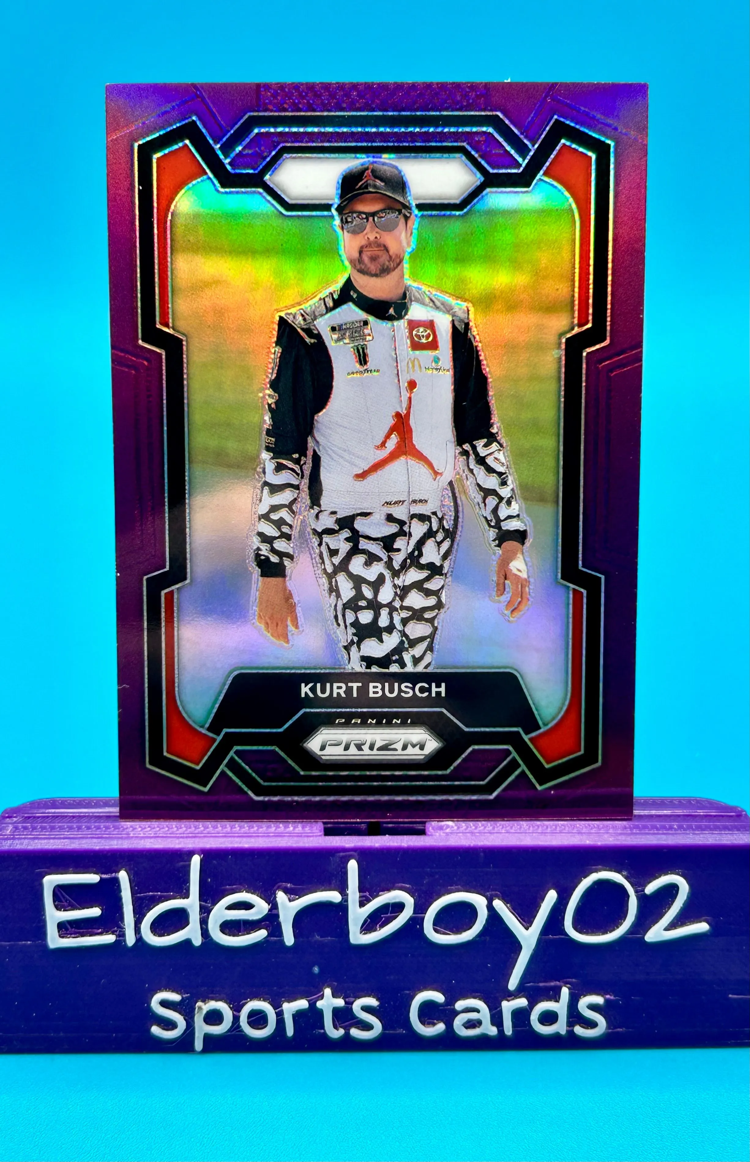 Product image for Kurt Busch 12/99 Purple Prizm 2024 Panini Prizm Racing Nascar