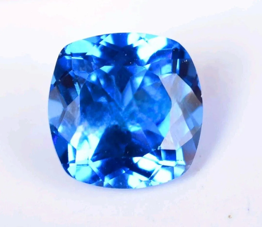 Product image for 5.85 Ct Loose Transparent Blue Zoisite Tanzanite-Like Excellent Cushion Cut Gemstone. This product i
