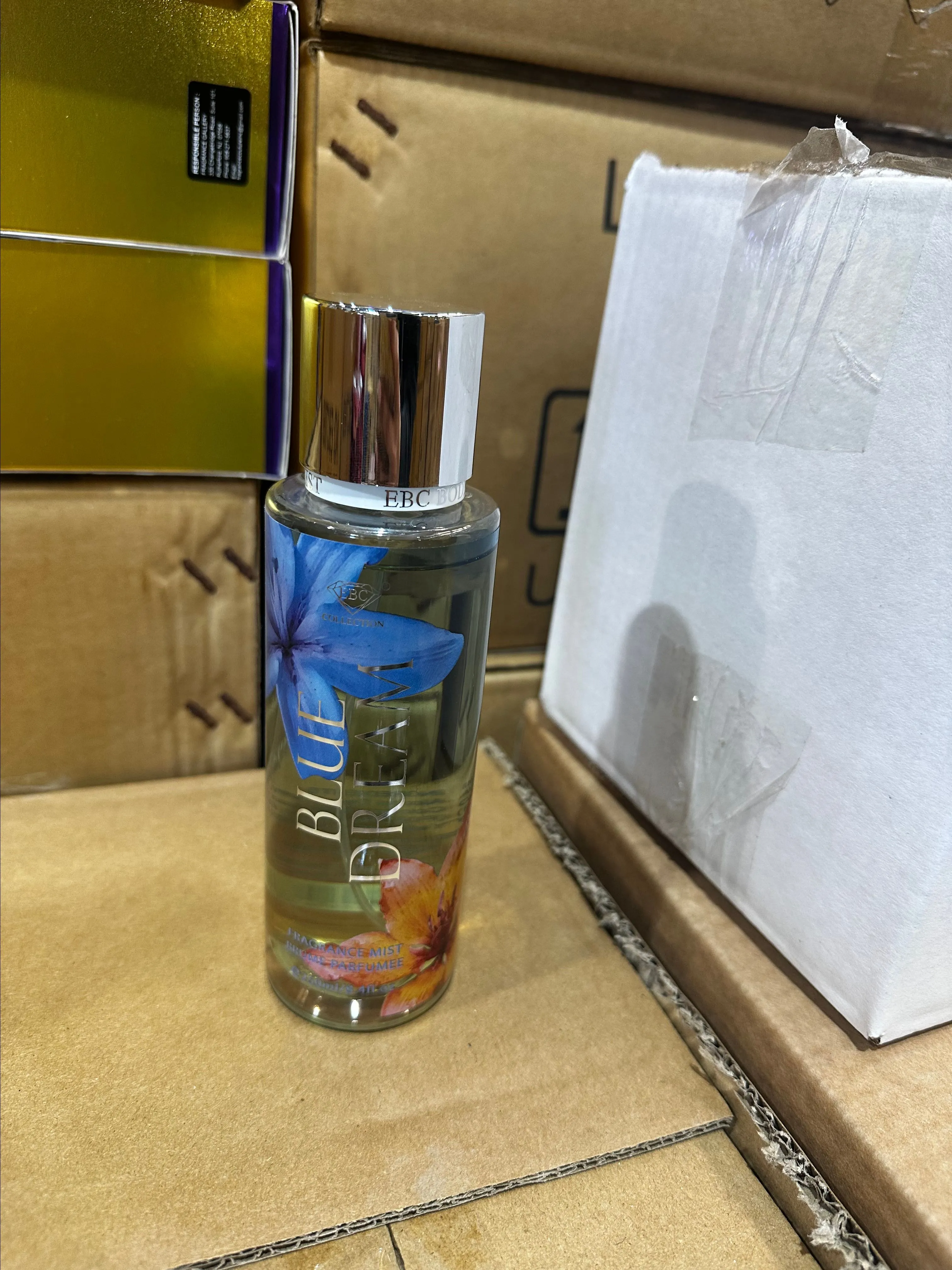 Product image for EBC Blue Dream body mist with floral design.