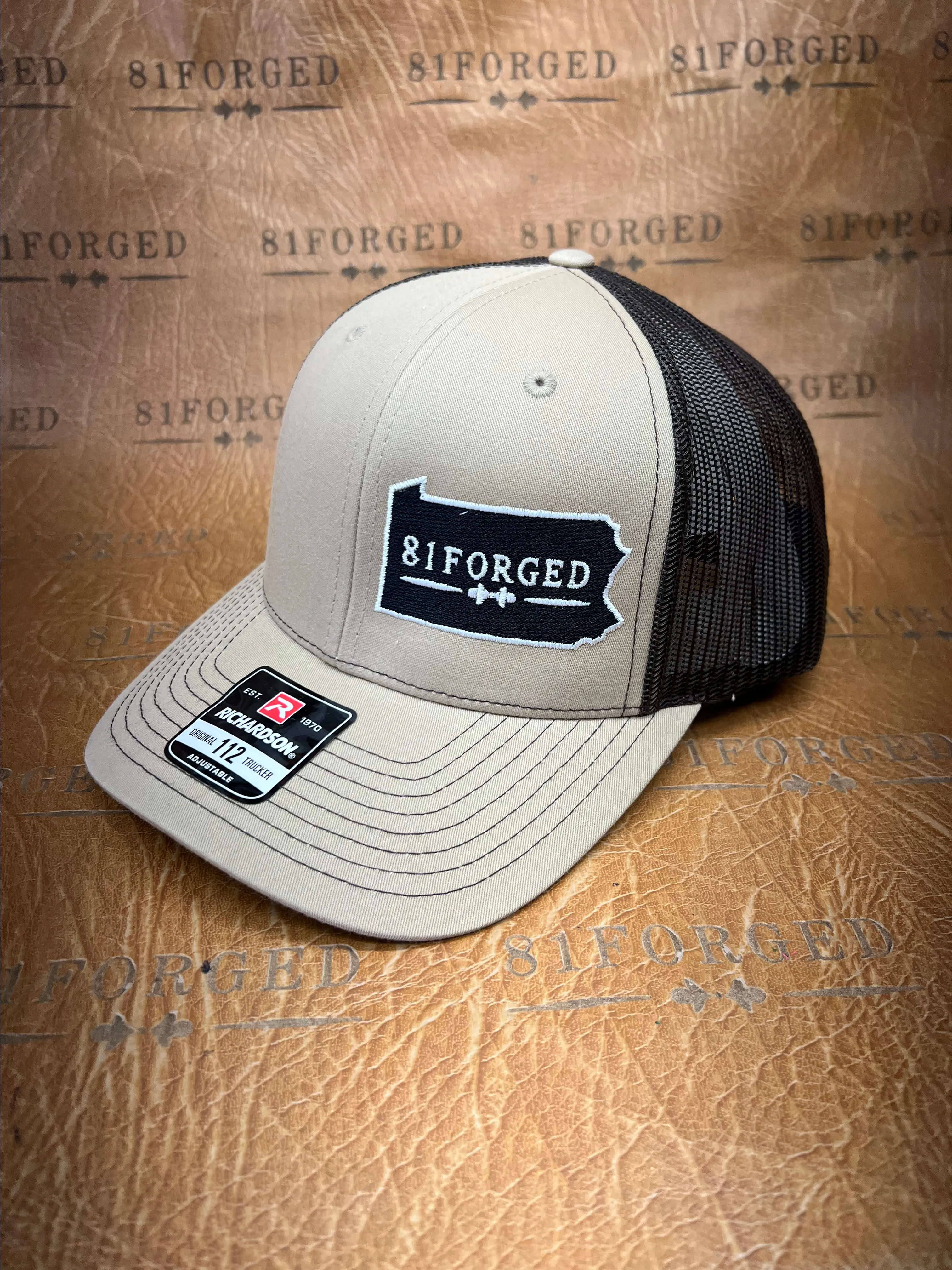Product image for Khaki Richardson 112  hat with the 81Forged Logo.