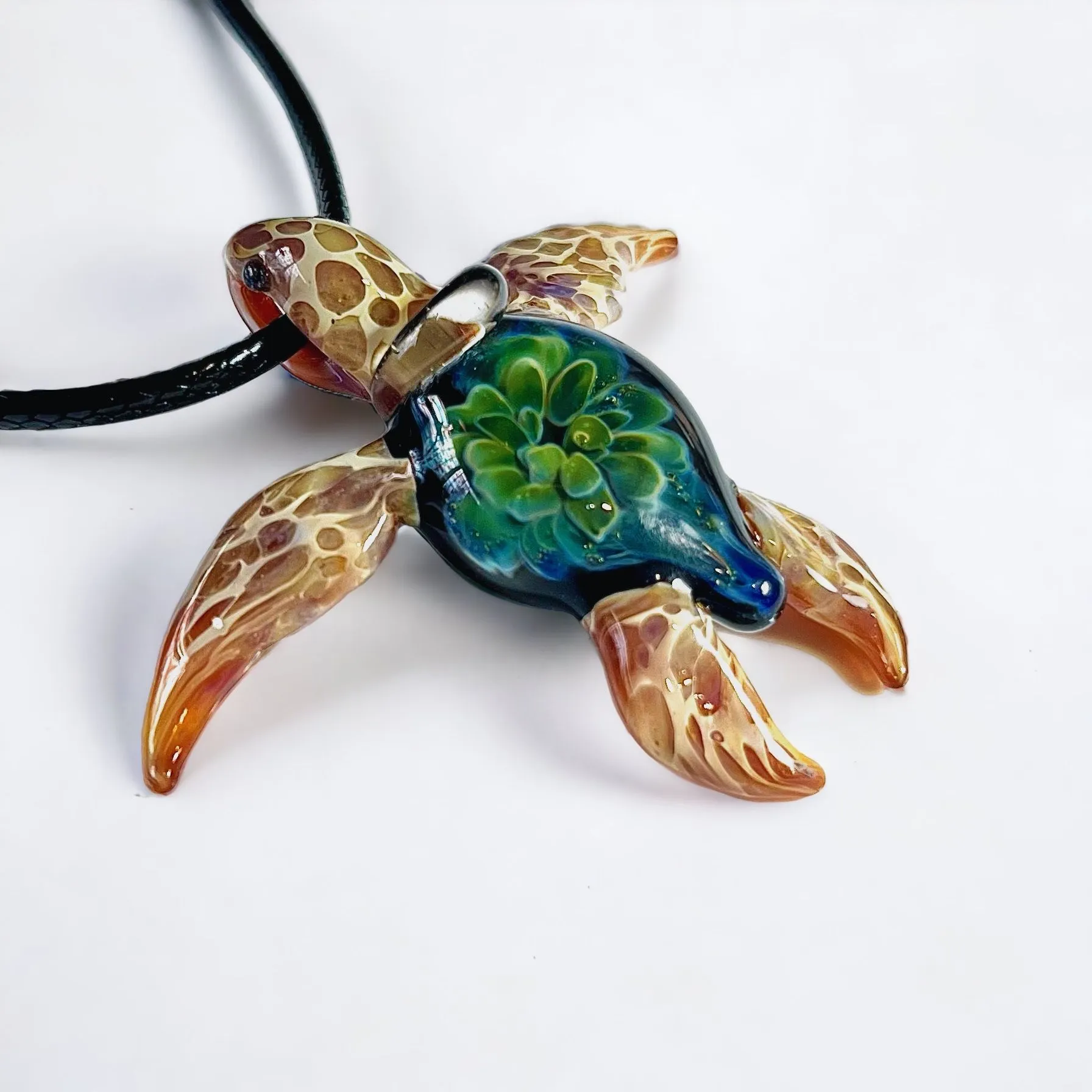 Product image for Glass-blown Honu Sea Turtle Pendant, ocean green with sand blonde colors
