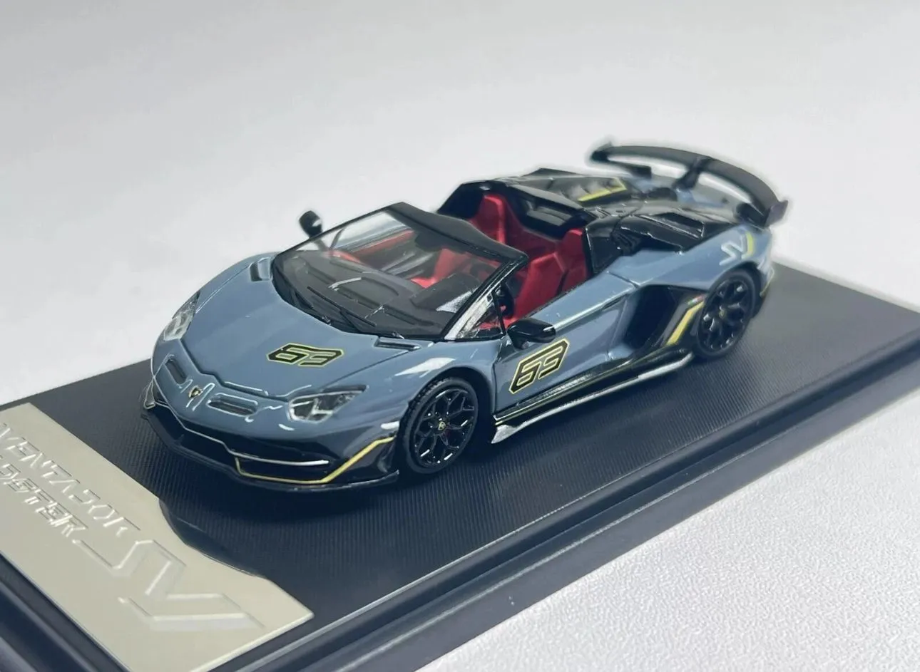 Product image for LAMBORGHINI AVENTADOR SVJ ROADSTER GREY BLUE 1/64 DIECAST CAR BY RHINO MODEL RM
