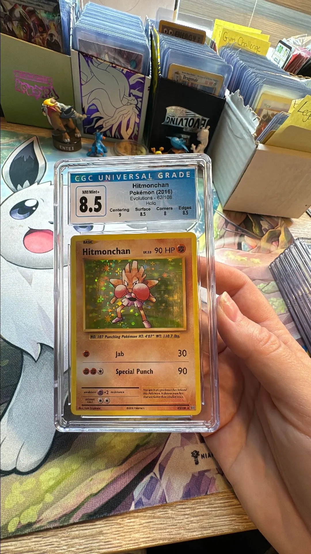 Product image for Slab - 2016 Evolutions Hitmonchan Holo CGC 8.5