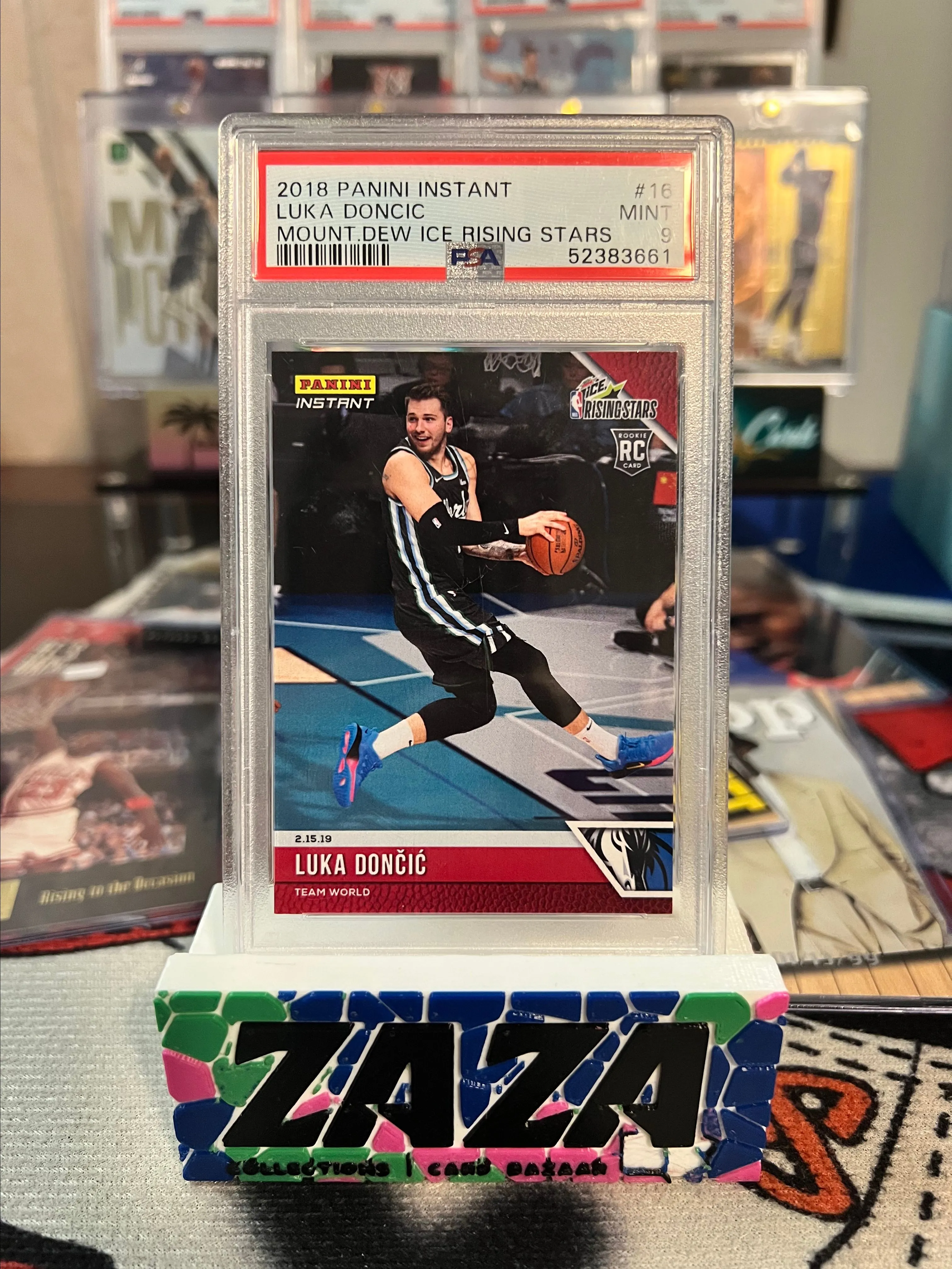 Product image for 2018 Panini Instant Luka Doncic Rookie RC Ice Rising Stars /563 #16 PSA 9 Mint