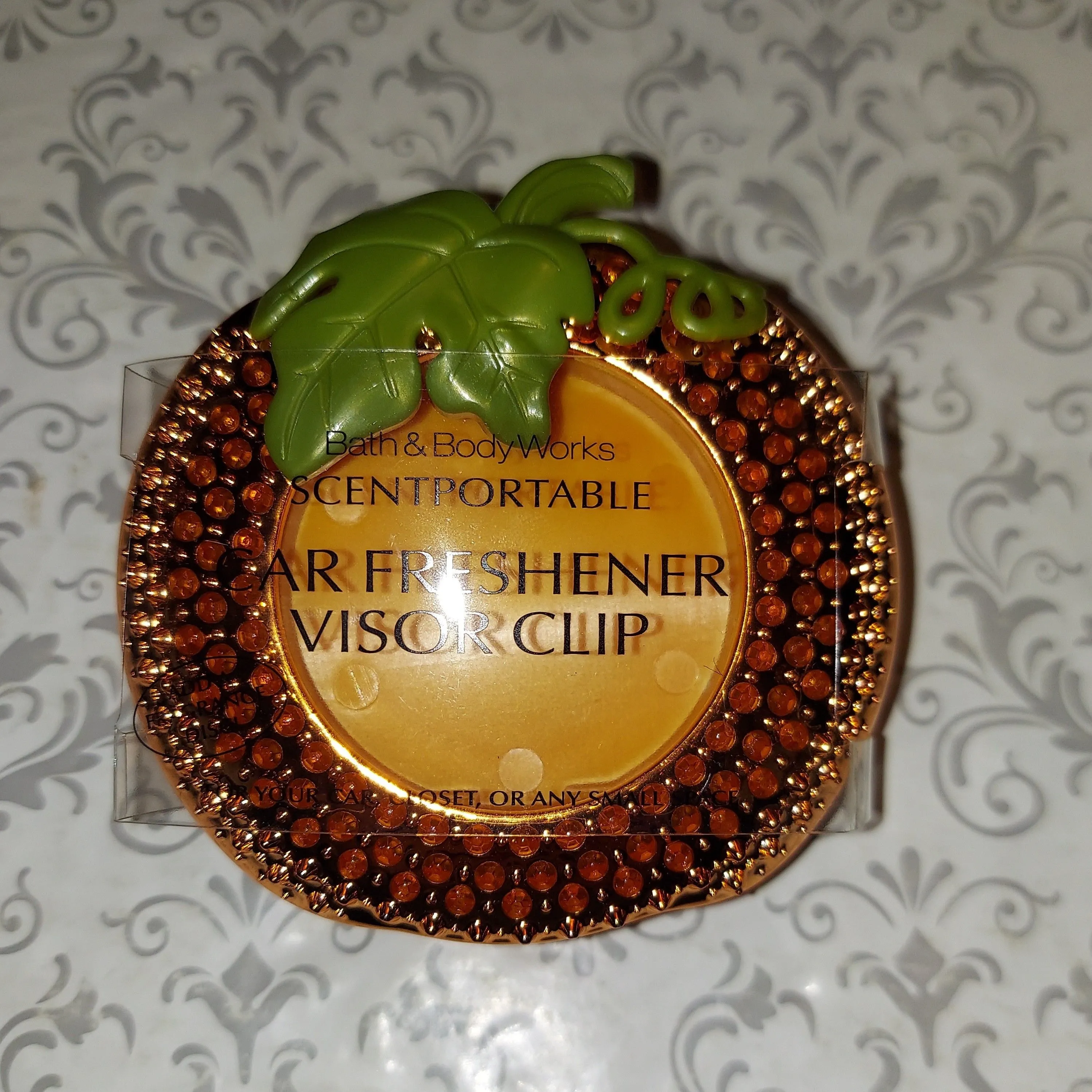 Product image for Bath & Body Works Rhinestone Pumpkin Scentportable Car Freshener Visor Clip 