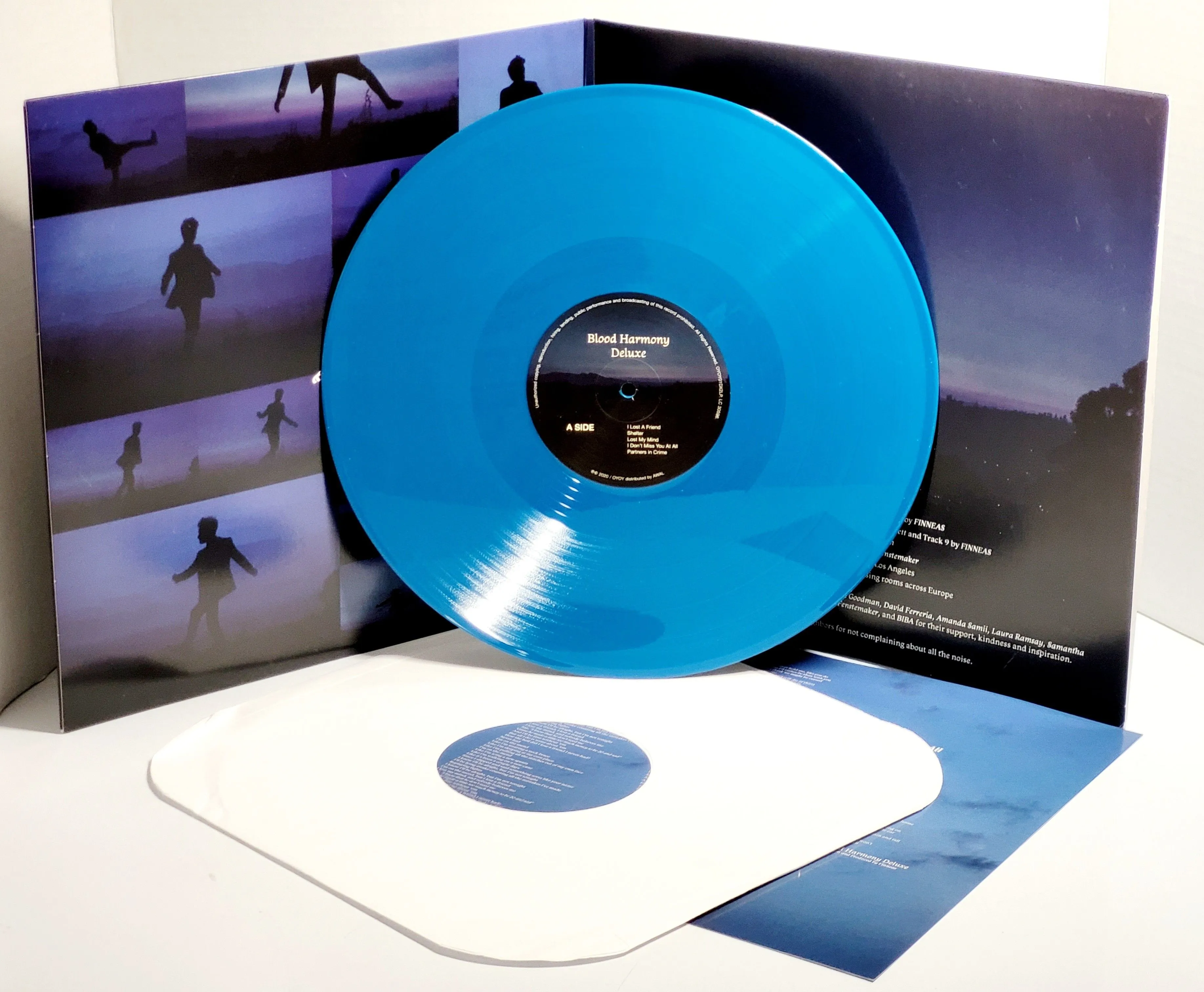 Product image for 2020 FINNEAS Deluxe Blood Harmony 12" Opaque Sky Blue LP Gatefold Vinyl Record. Used Excellent Condi