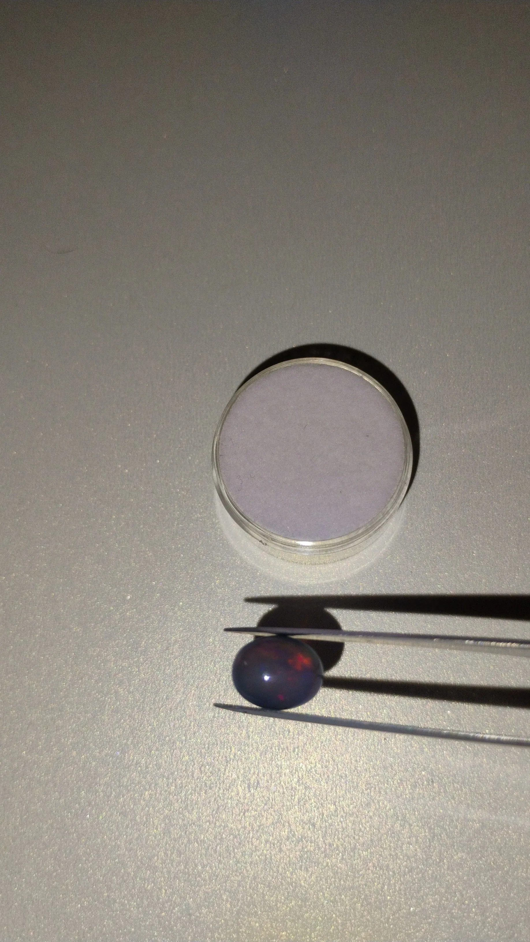 Product image for 2.46ct. Black Opal Oval Cabachon *smoked*