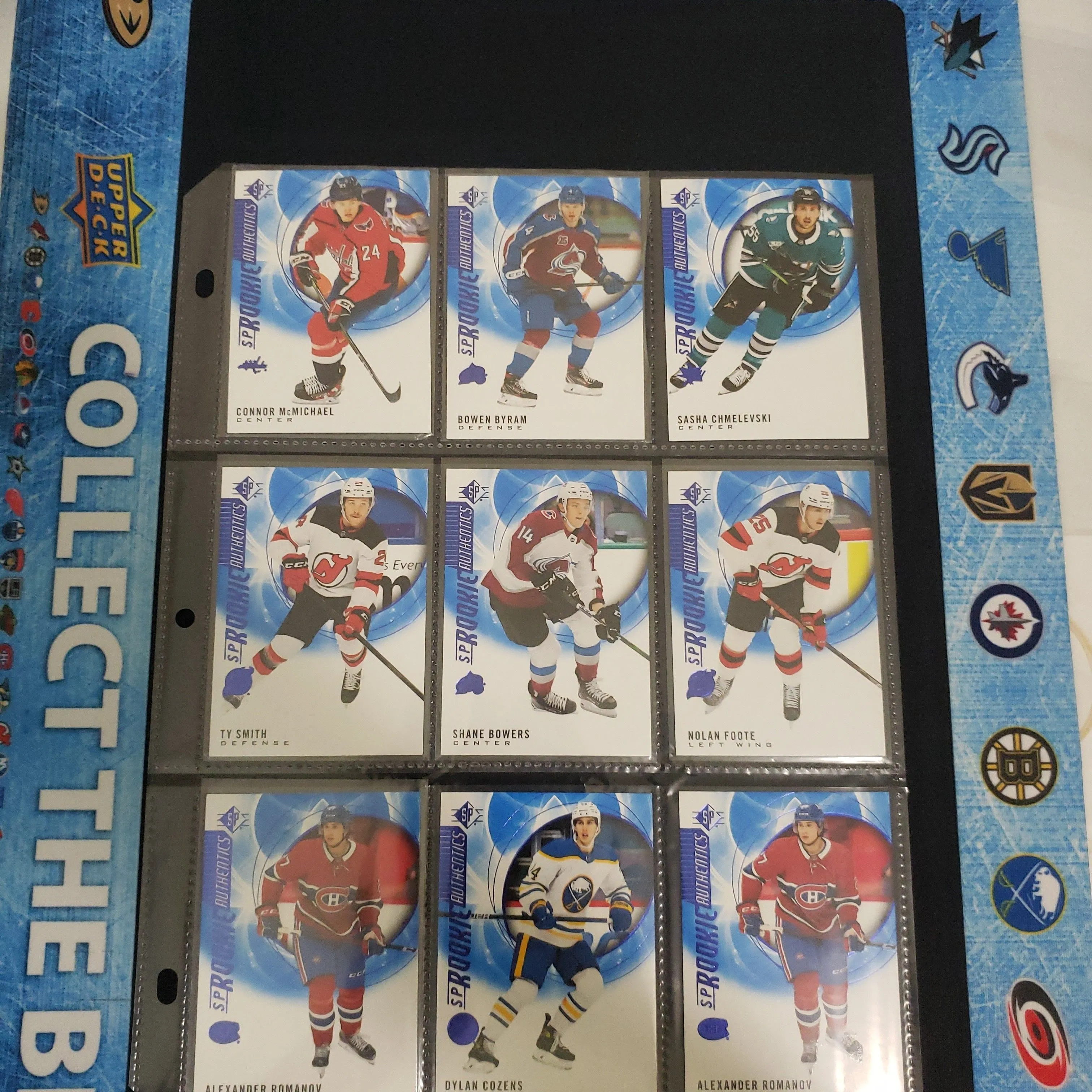 Product image for 9 Card Dealer Sheet #48 Authentic Rookie McMichael Byram Chmelevski Smith Bowers Foote Romanov Cozens (Hockey)
