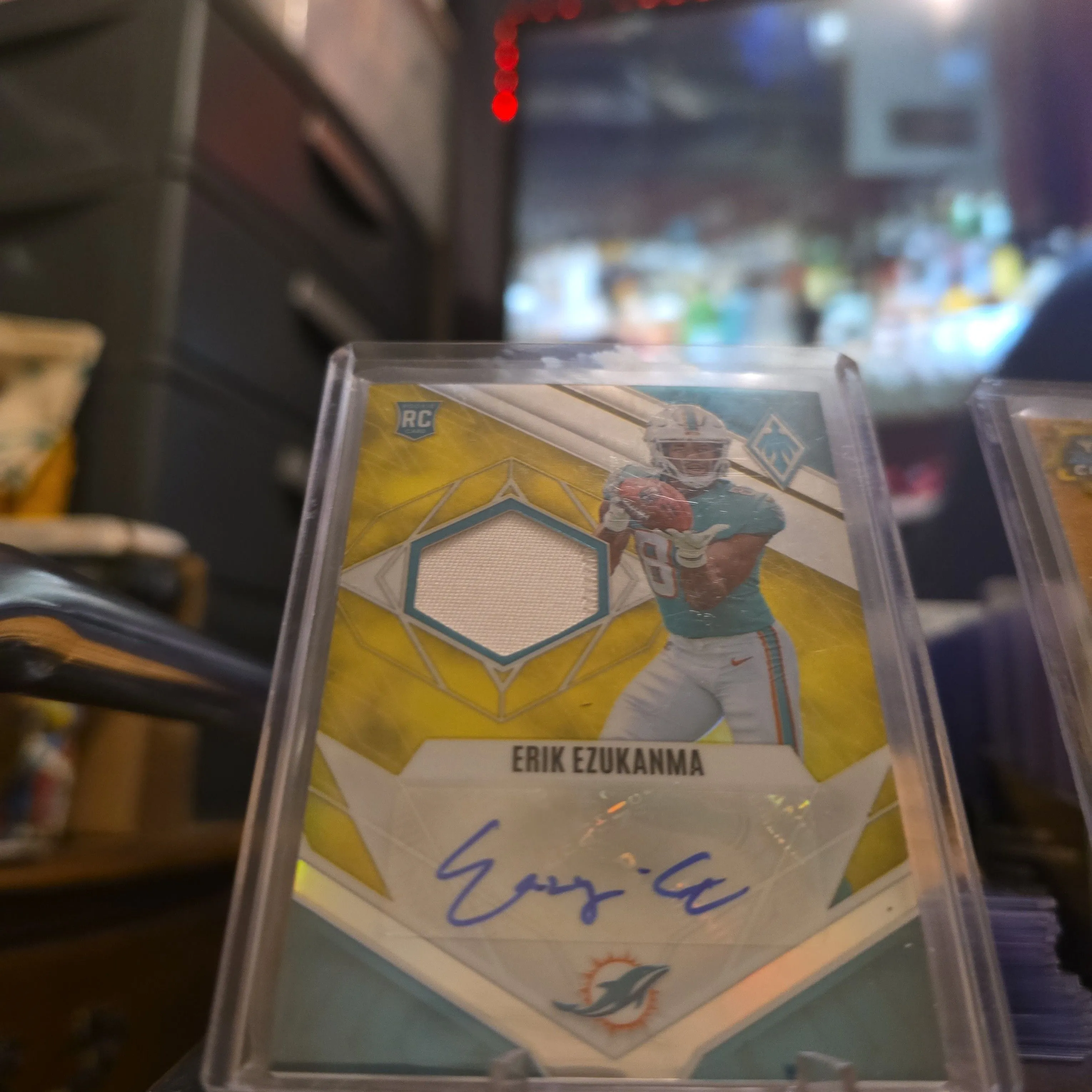 Product image for 2022 Panini Phoenix Erik Ezukanma RC Jersey Auto # /75 Miami Dolphins Rookie