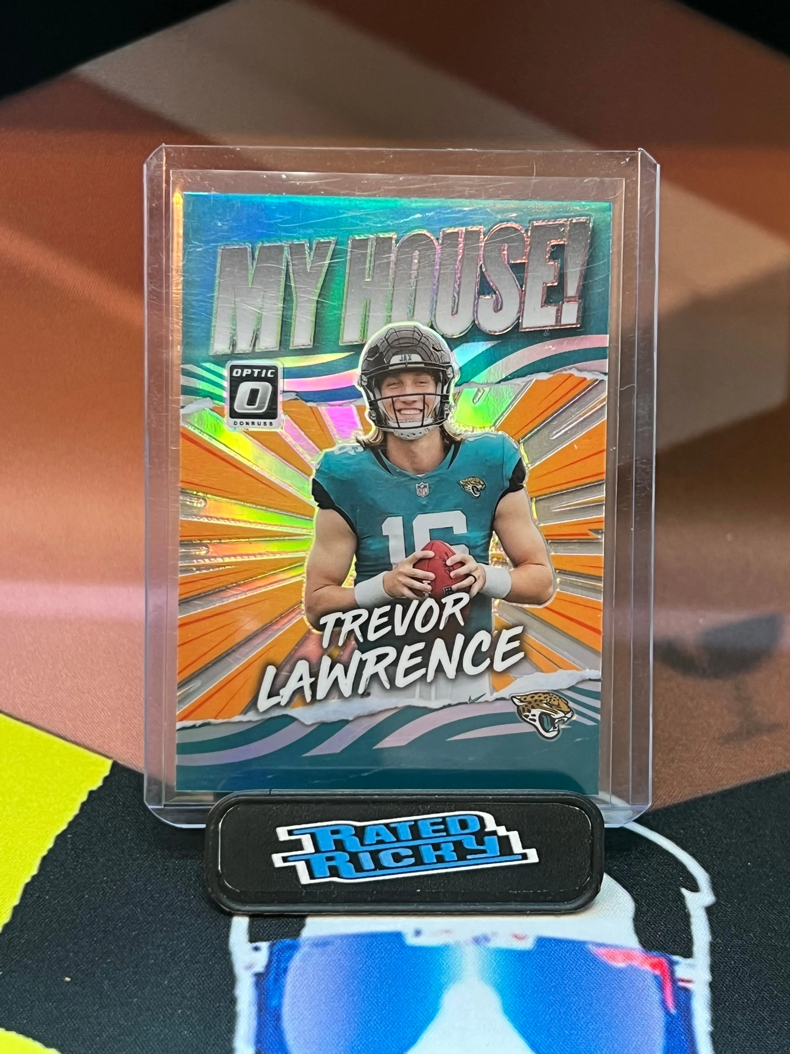 Product image for Trevor Lawrence Rookie 2021 optic My house Prizm Jacksonville Jaguars