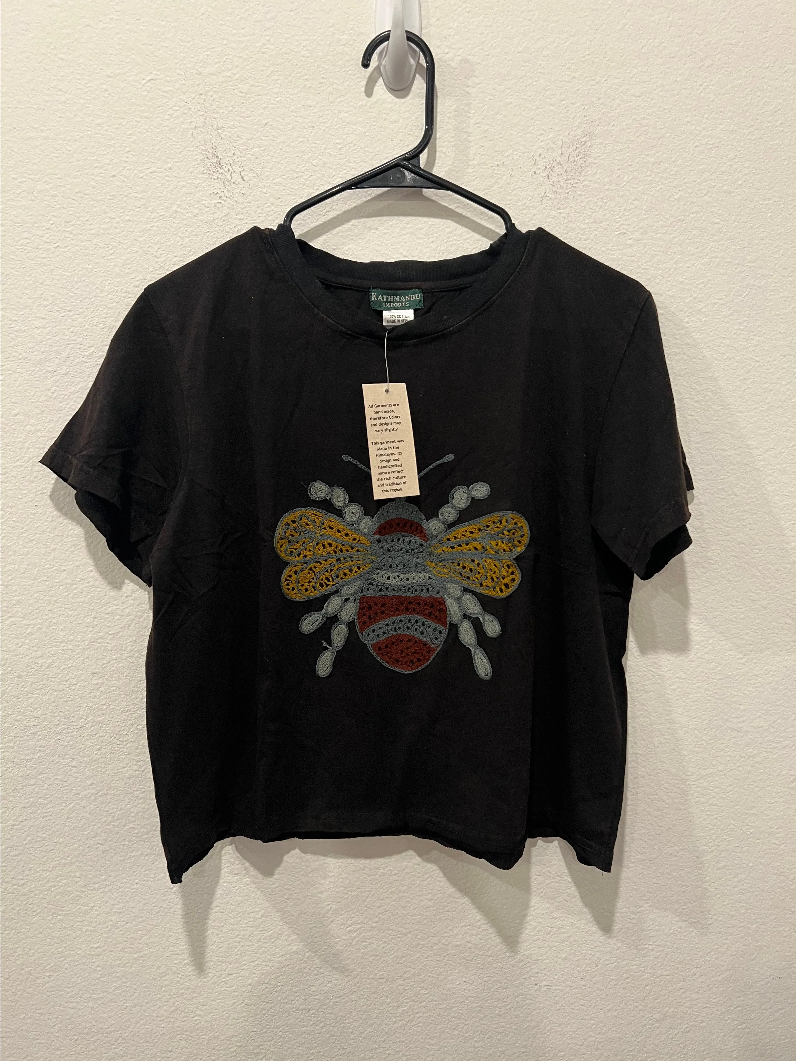Product image for Black Bee Embroidered Top by Kathmandu Size M/L