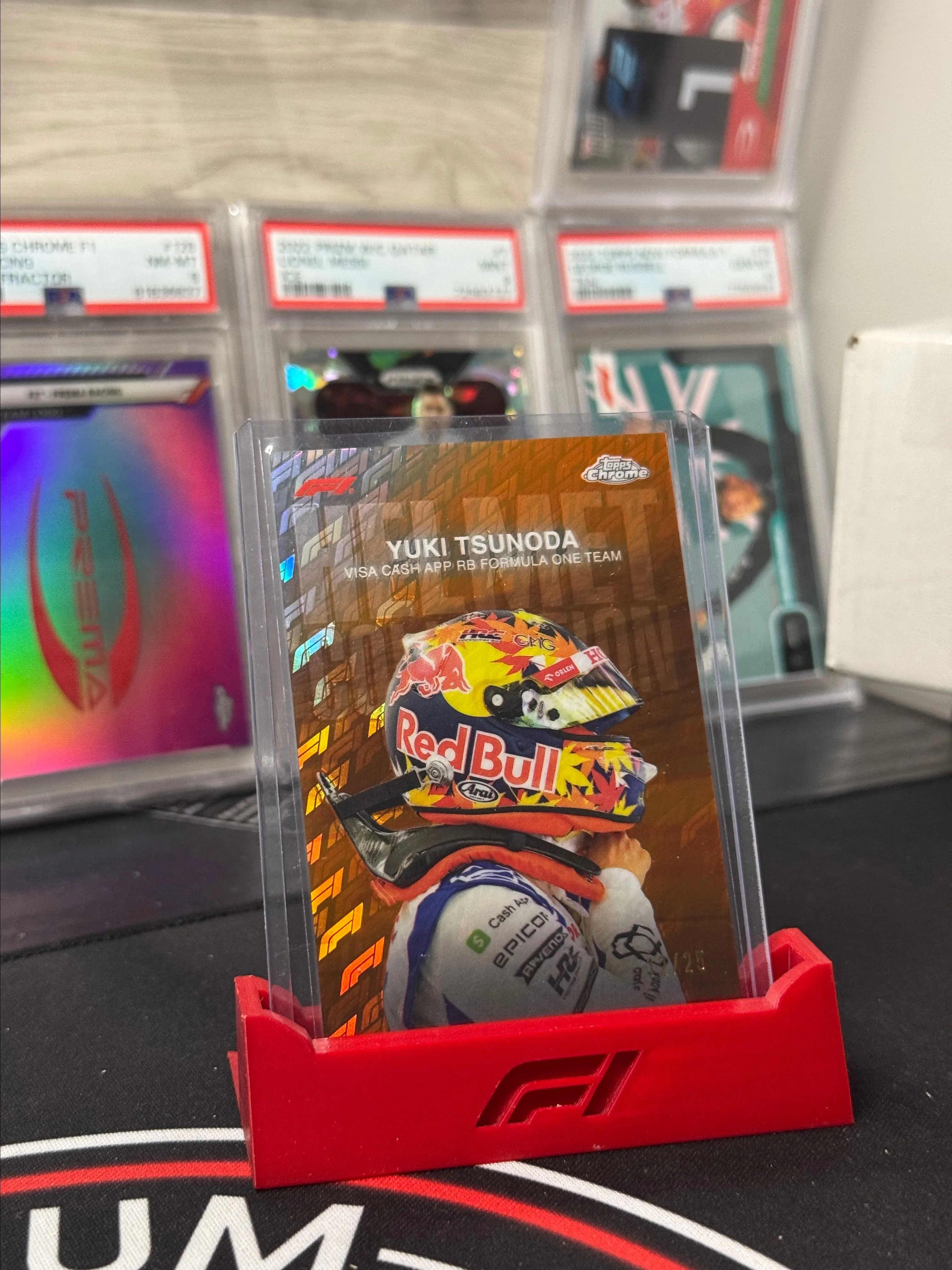 Product image for 2024 Topps Chrome Formula 1 Logofractor - Yuki Tsunoda Orange Helmet /25
